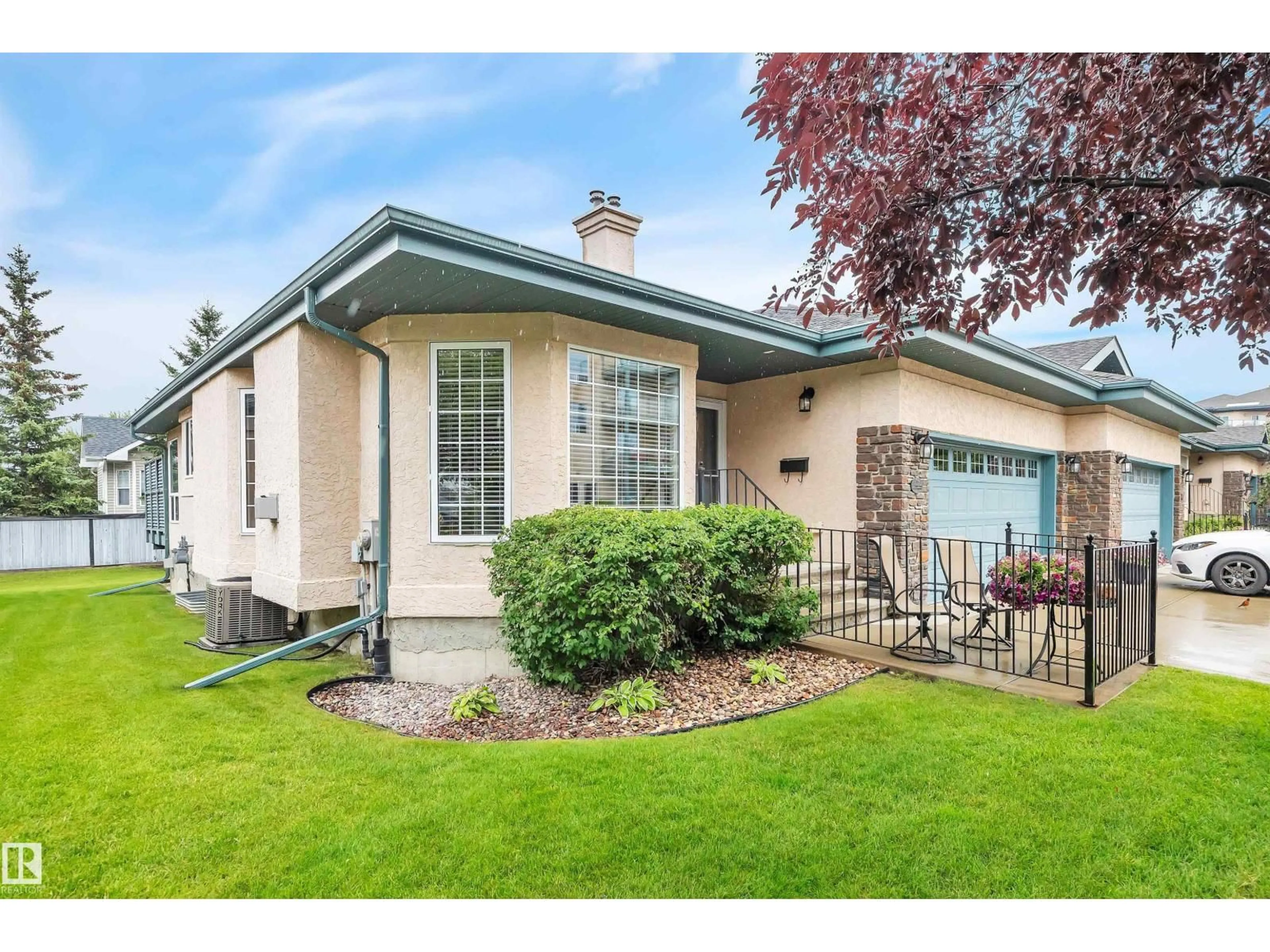 Home with vinyl exterior material, street for 6 - 102 BRIDGEPORT CX, Leduc Alberta T9E8K8