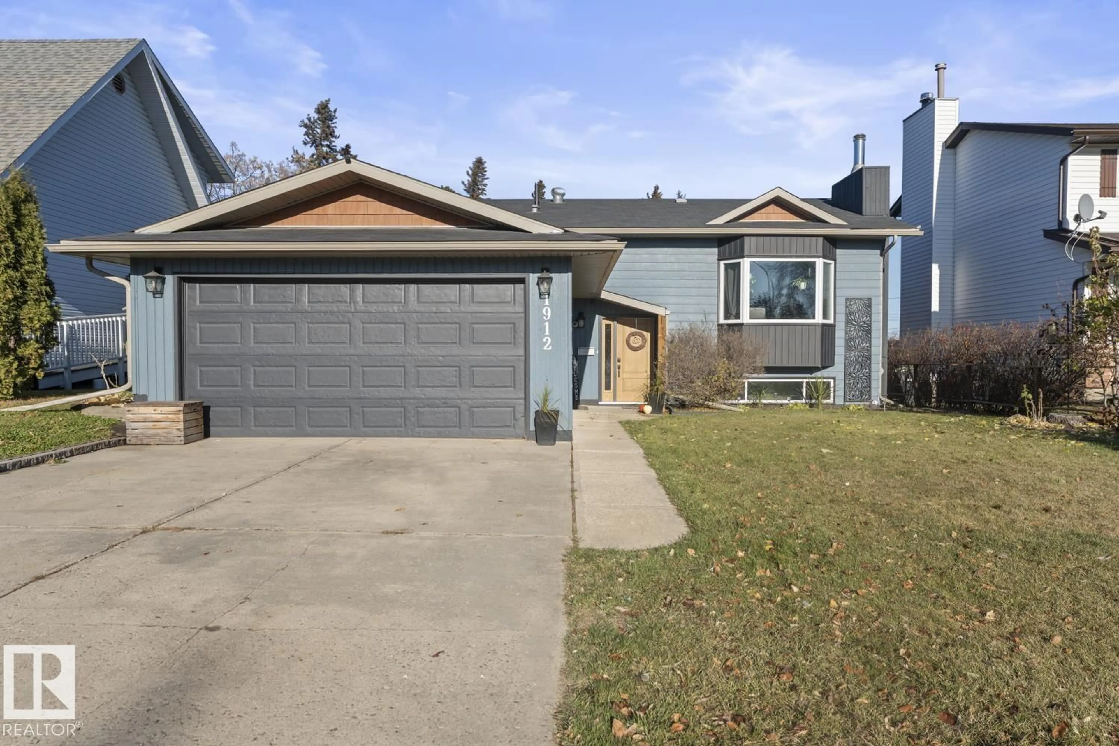 Home with vinyl exterior material, street for 1912 2 AV, Cold Lake Alberta T9M1E3
