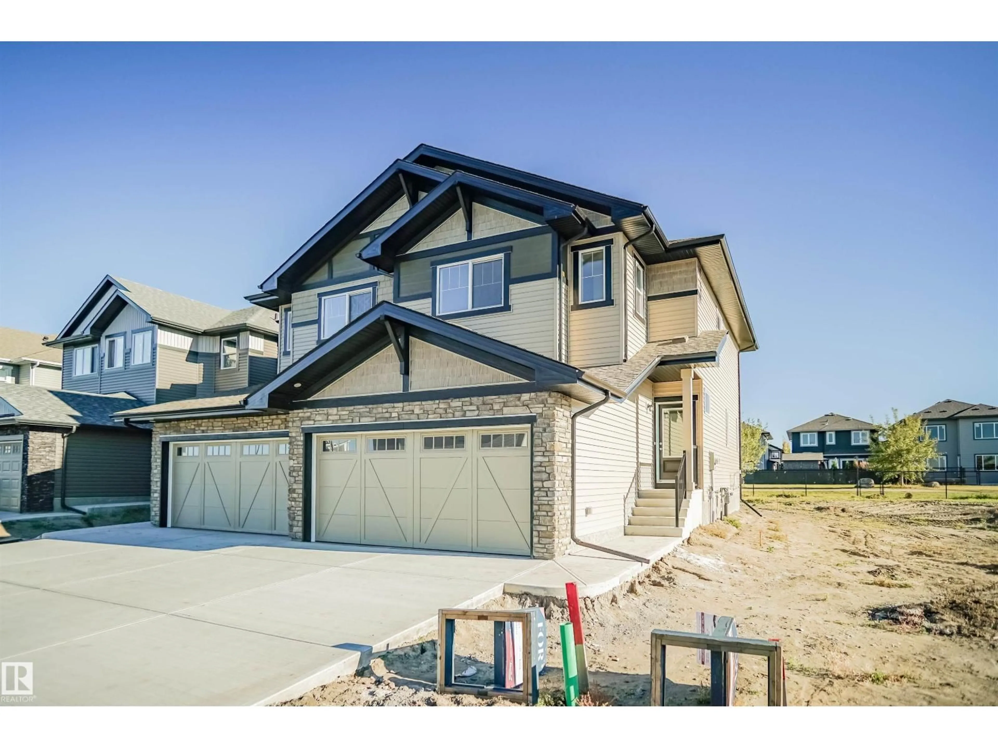 Home with vinyl exterior material, street for 203 SAVOY CR, Sherwood Park Alberta T8H1A8
