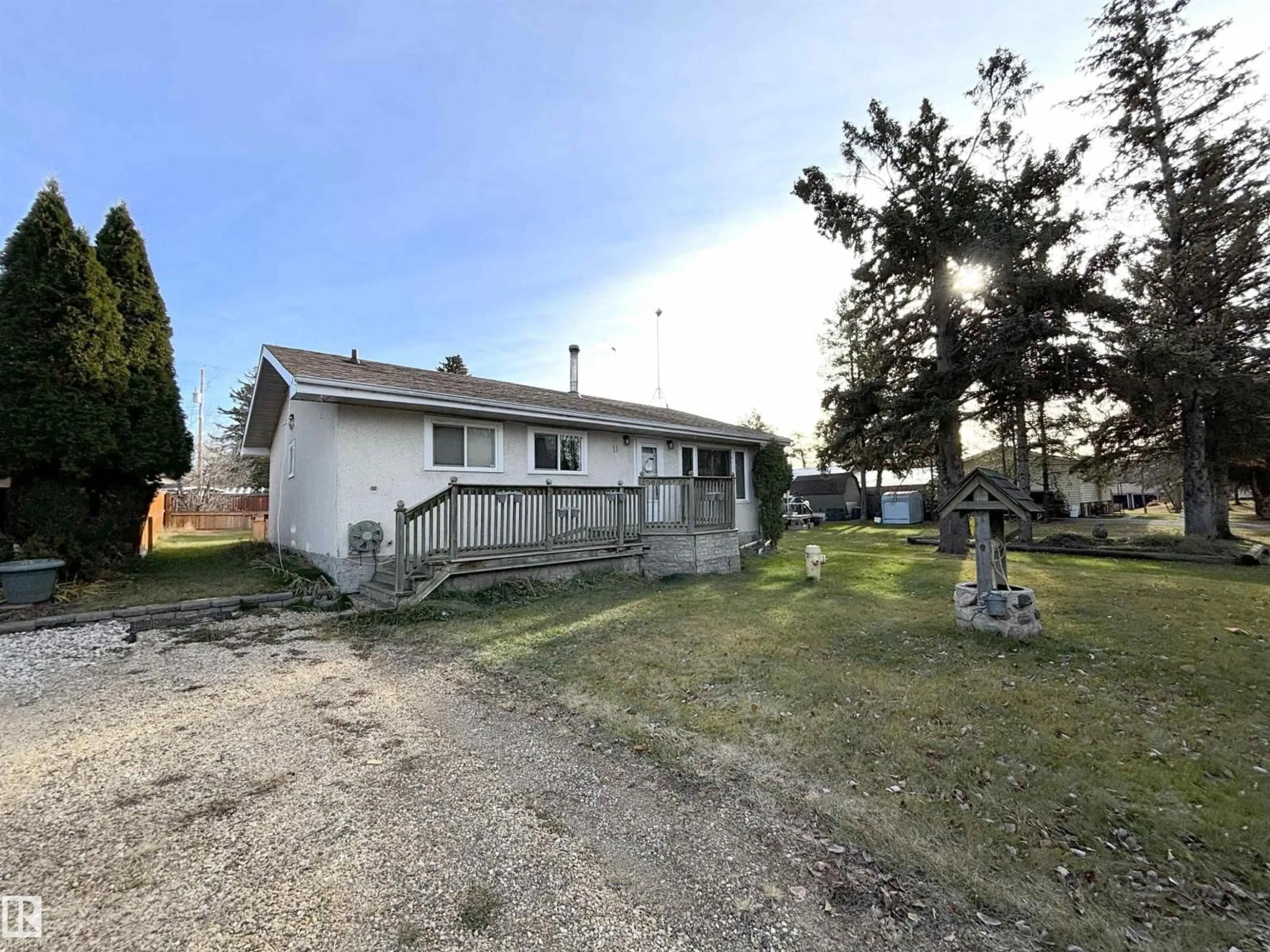 A pic from outside/outdoor area/front of a property/back of a property/a pic from drone, street for #11 - 20575 WYE RD, Rural Strathcona County Alberta T8G1H1