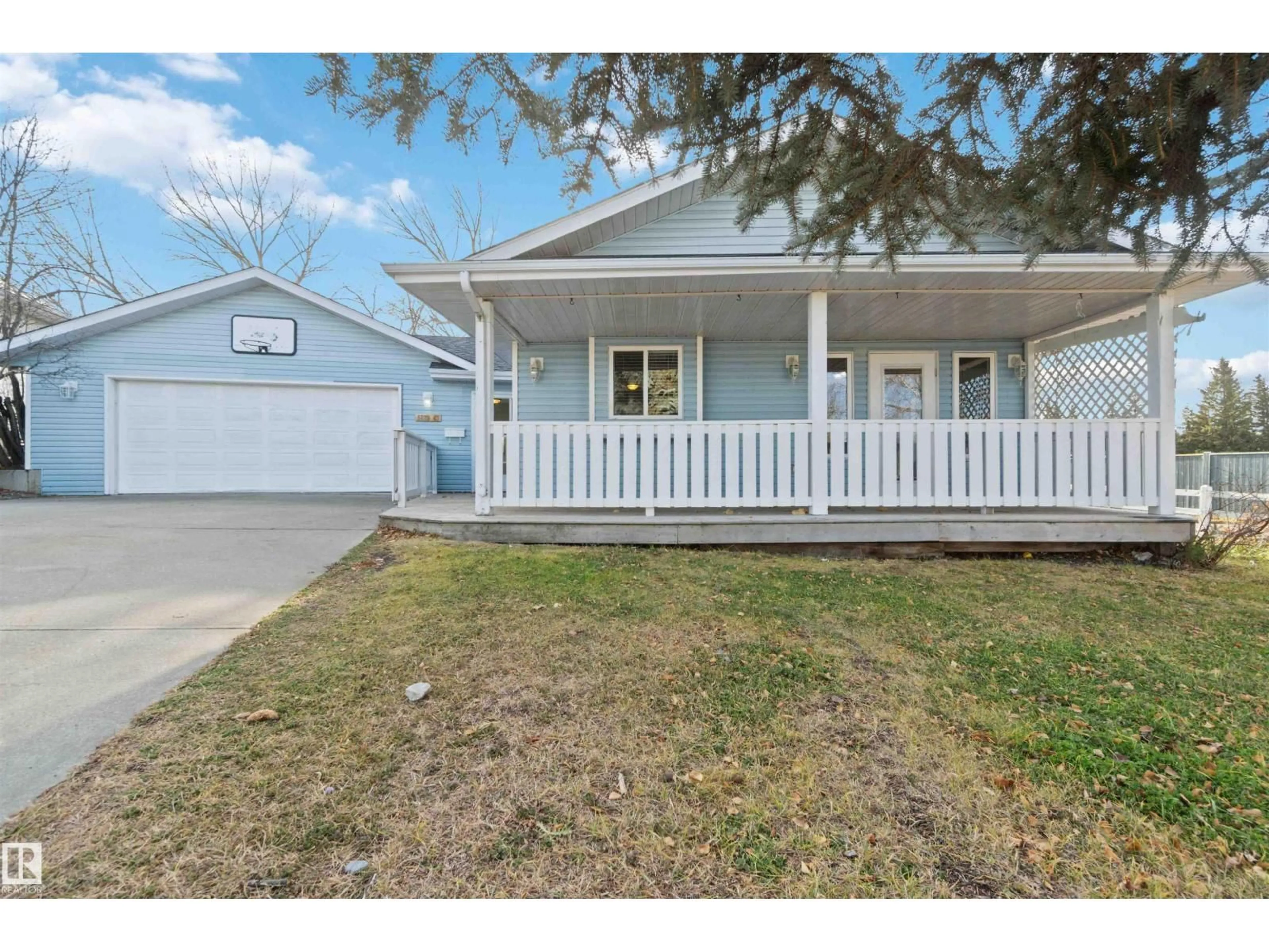 Home with vinyl exterior material, street for 5223 47 AV, Gibbons Alberta T0A1N0