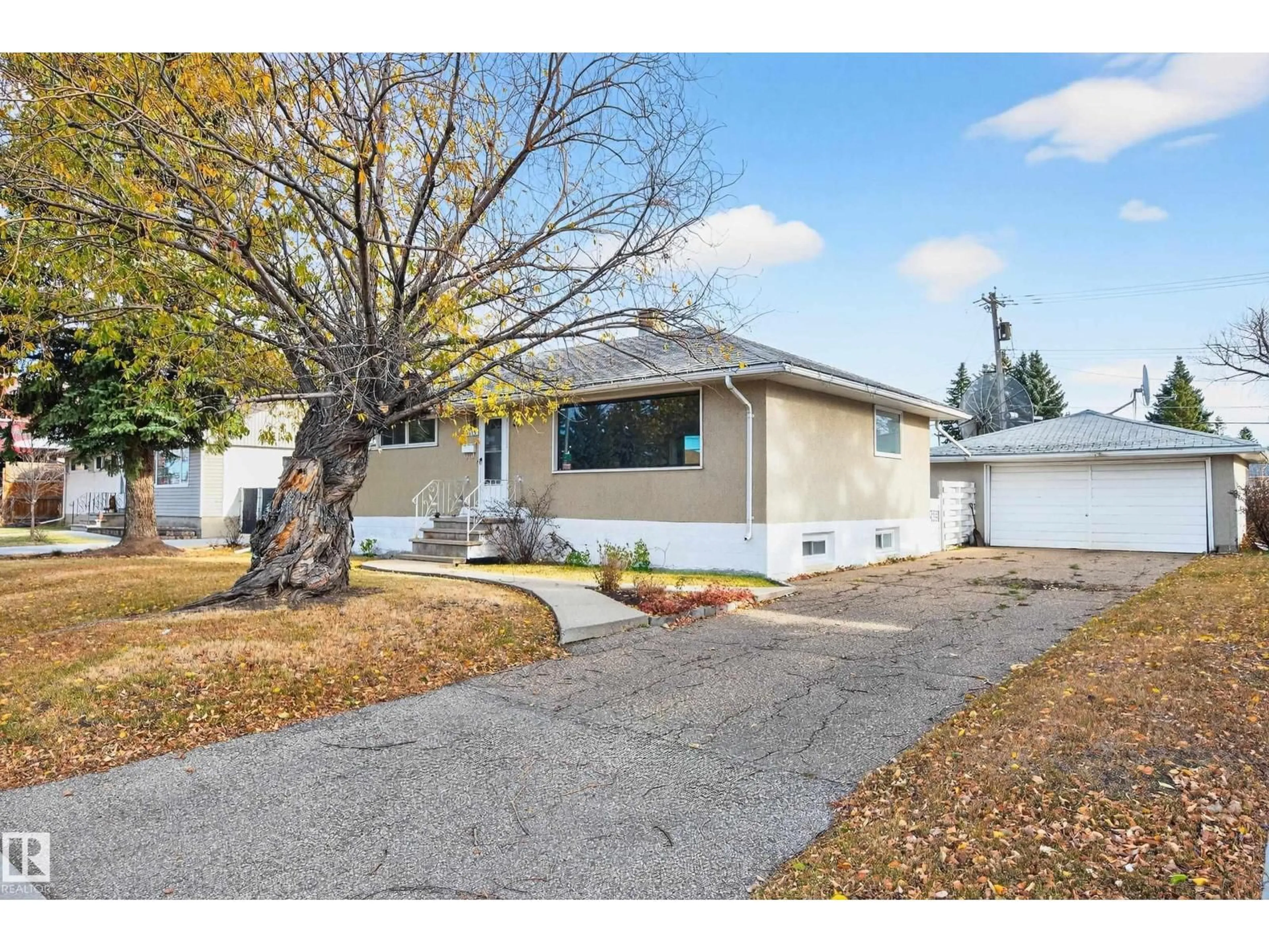 Home with vinyl exterior material, street for NW - 8515 149 ST, Edmonton Alberta T5R1B3