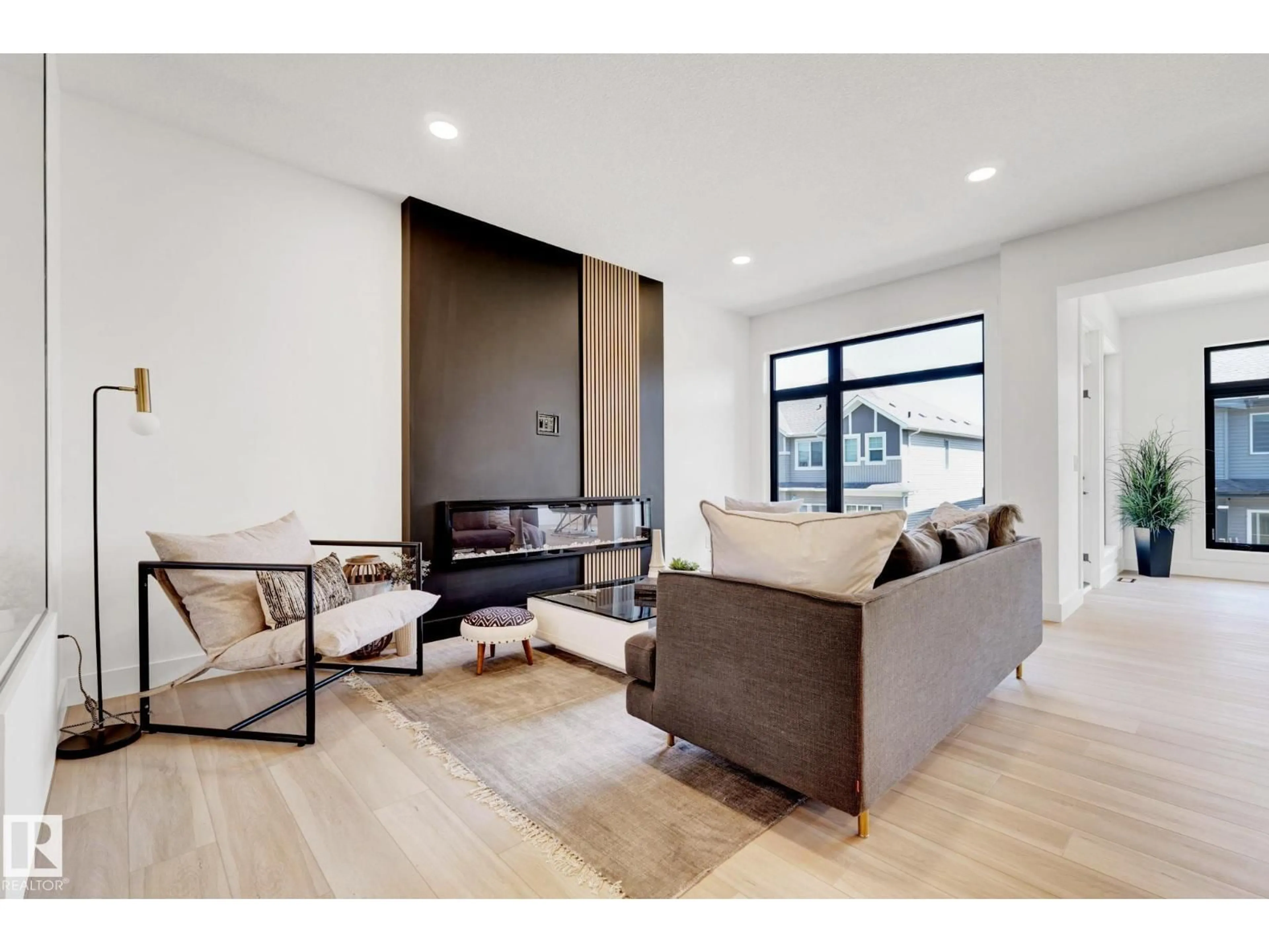 Living room with furniture, unknown for 5455 KOOTOOK RD, Edmonton Alberta T6W2Z5