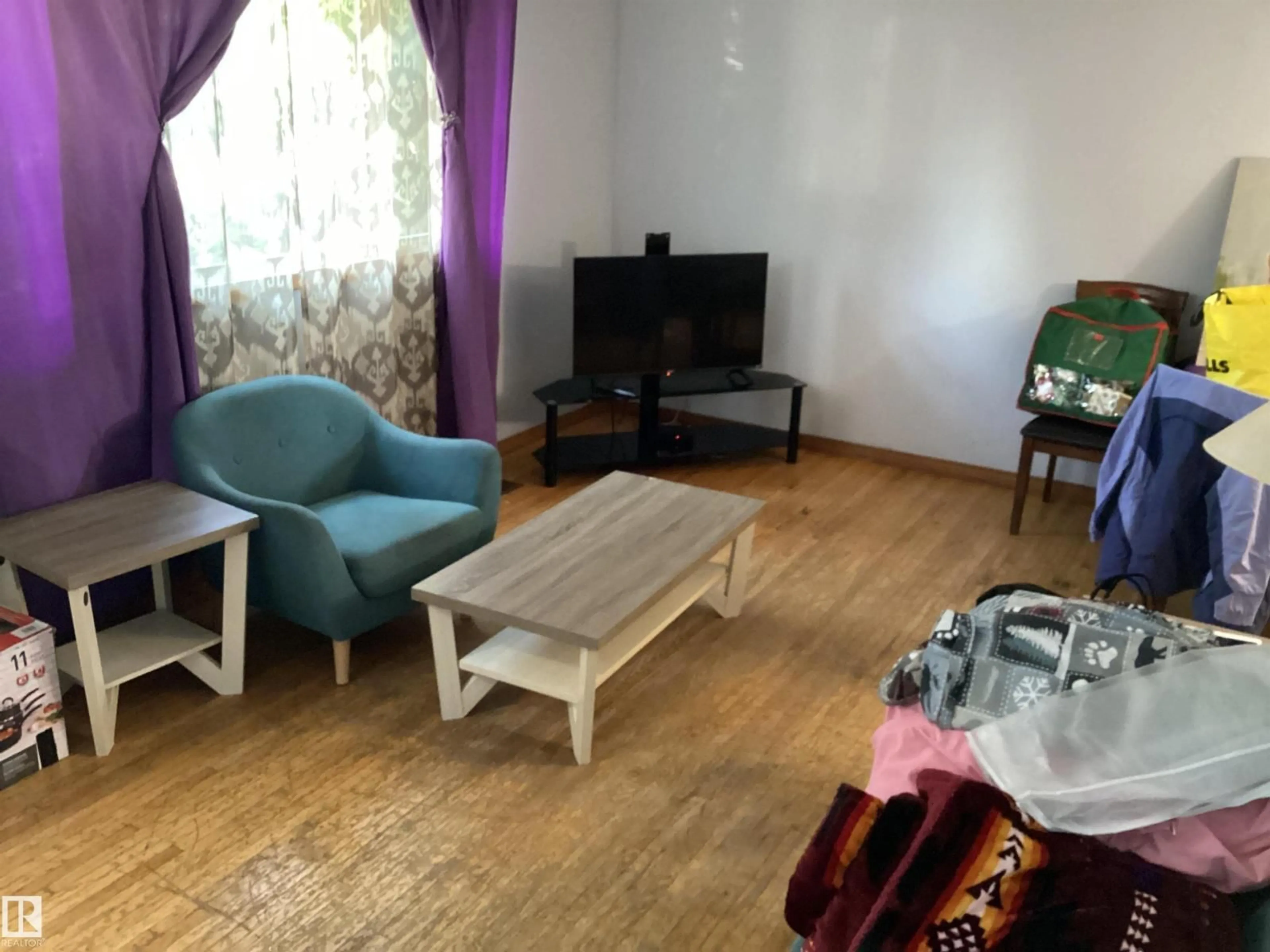 Living room with furniture, unknown for 16131 109A AV, Edmonton Alberta T5P1C5