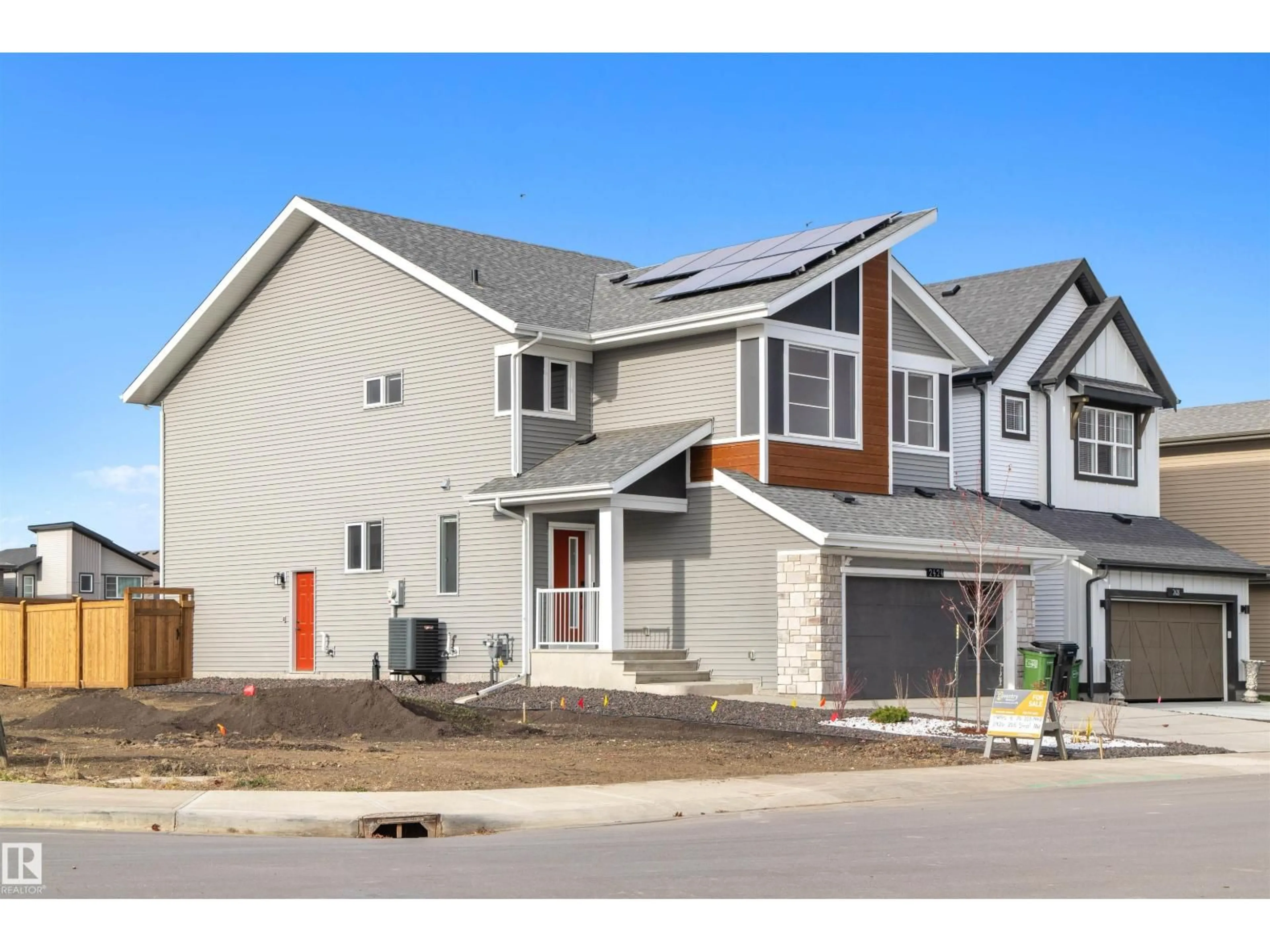 Home with brick exterior material, street for NW - 2424 205 ST, Edmonton Alberta T6M1N6