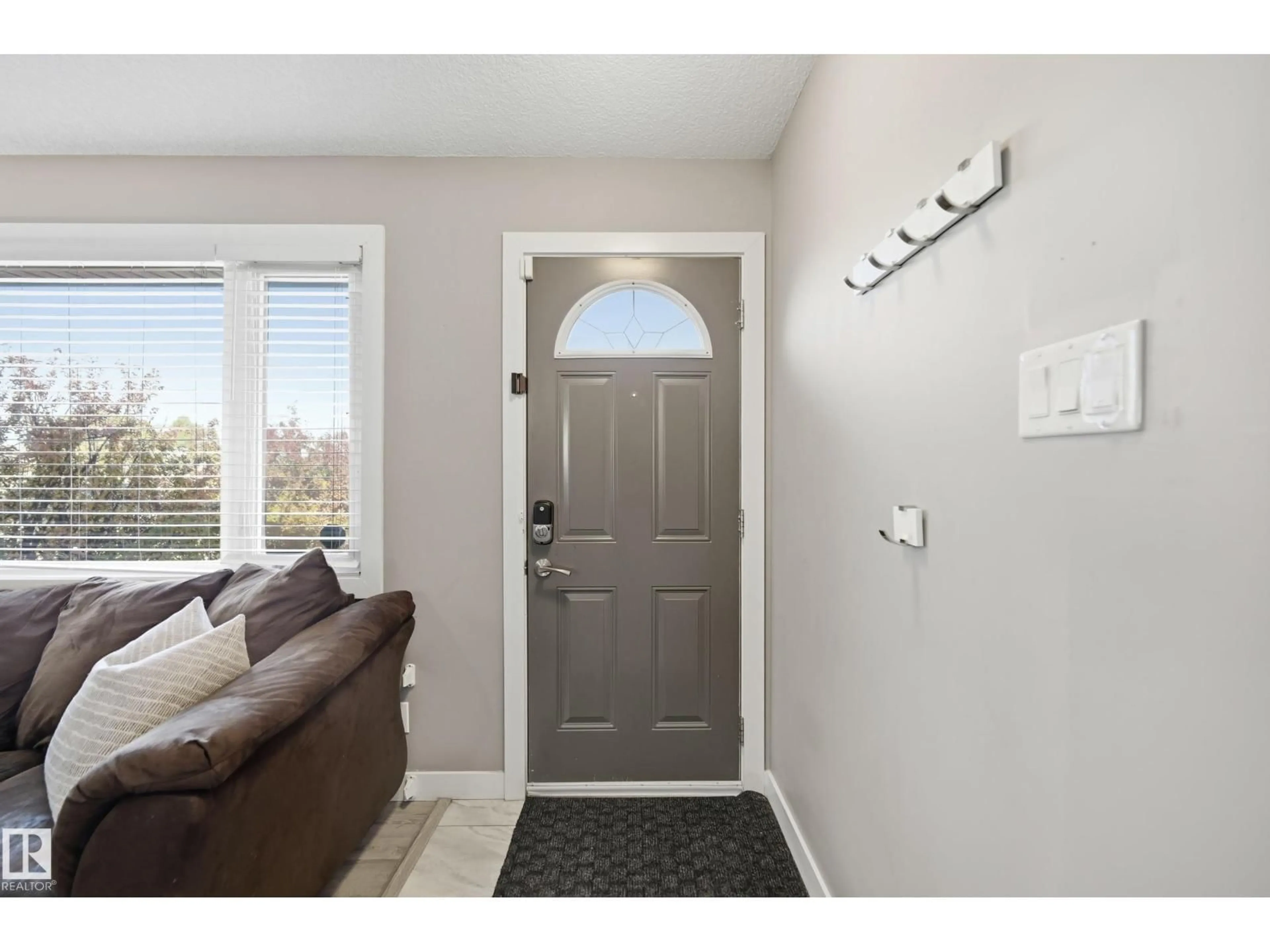 Indoor entryway for 8015 130 AV, Edmonton Alberta T5C1Y6