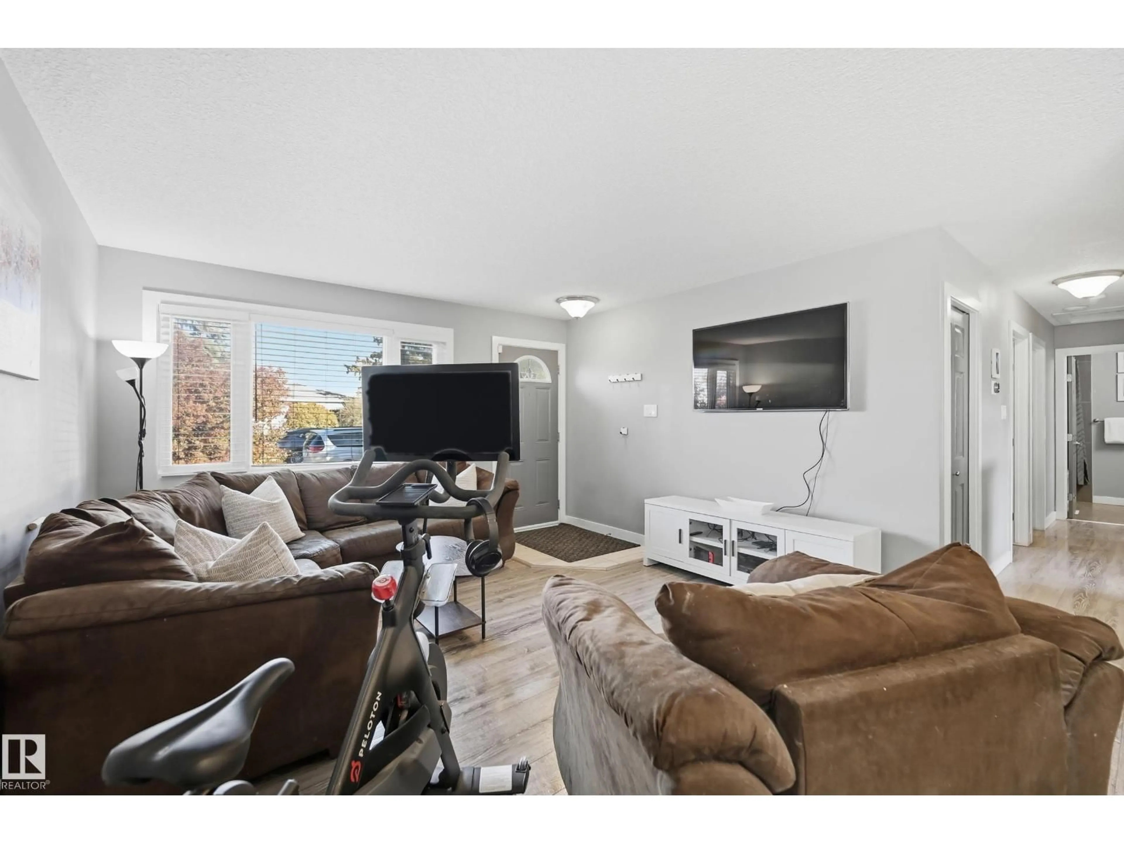 Living room with furniture, unknown for 8015 130 AV, Edmonton Alberta T5C1Y6