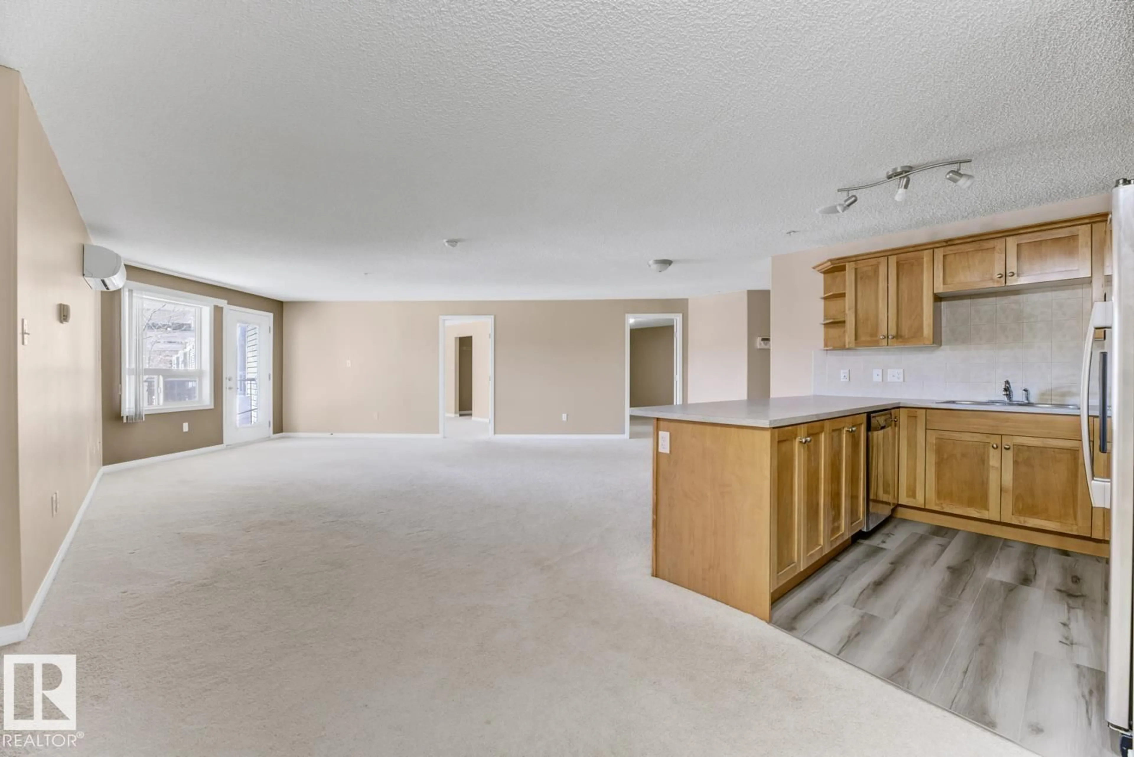 Open concept kitchen, unknown for #230 - 1520 HAMMOND GA, Edmonton Alberta T6M0J4