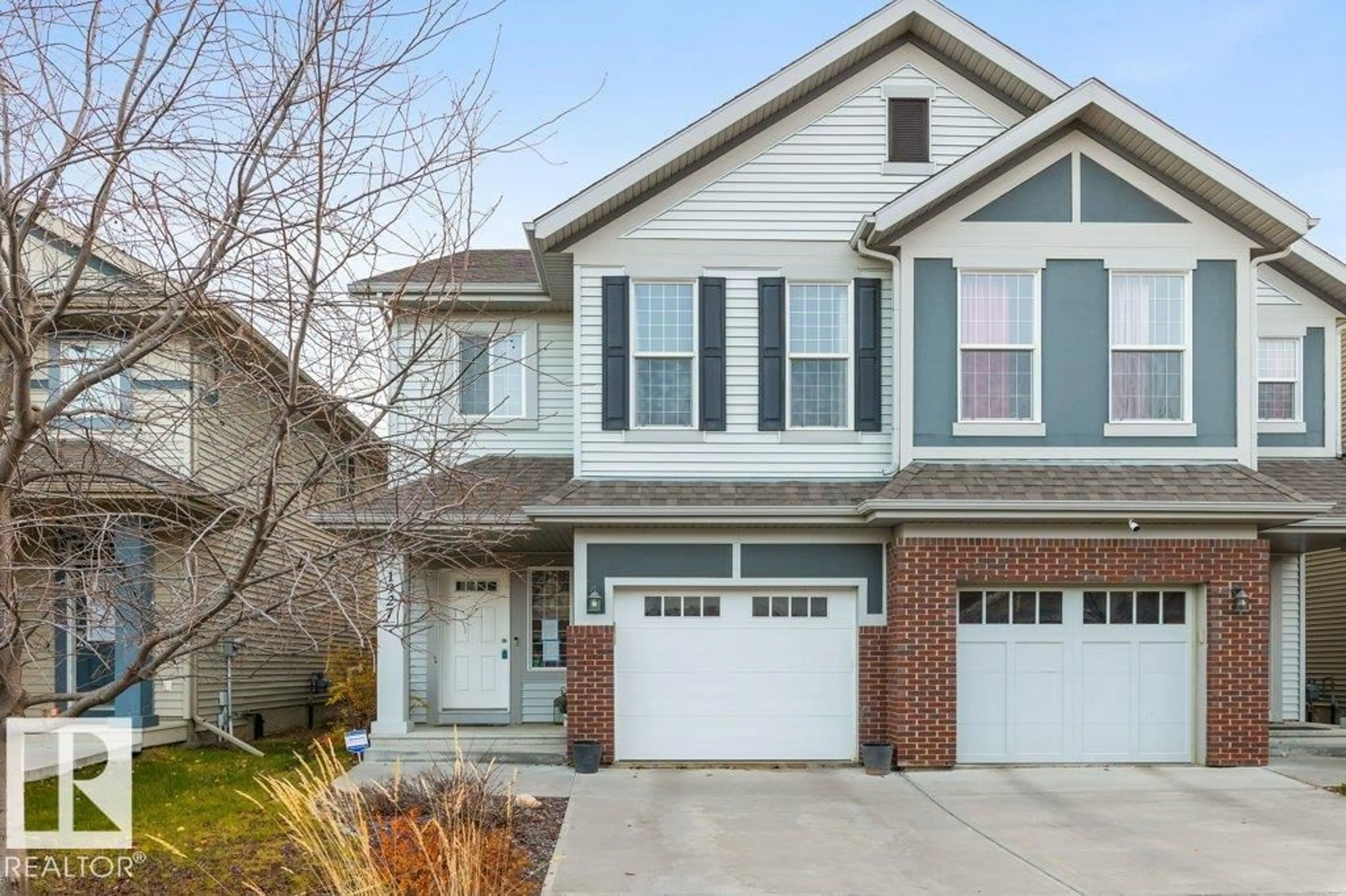 Home with brick exterior material, street for 1927 CHAPMAN RD, Edmonton Alberta T6W0Y7