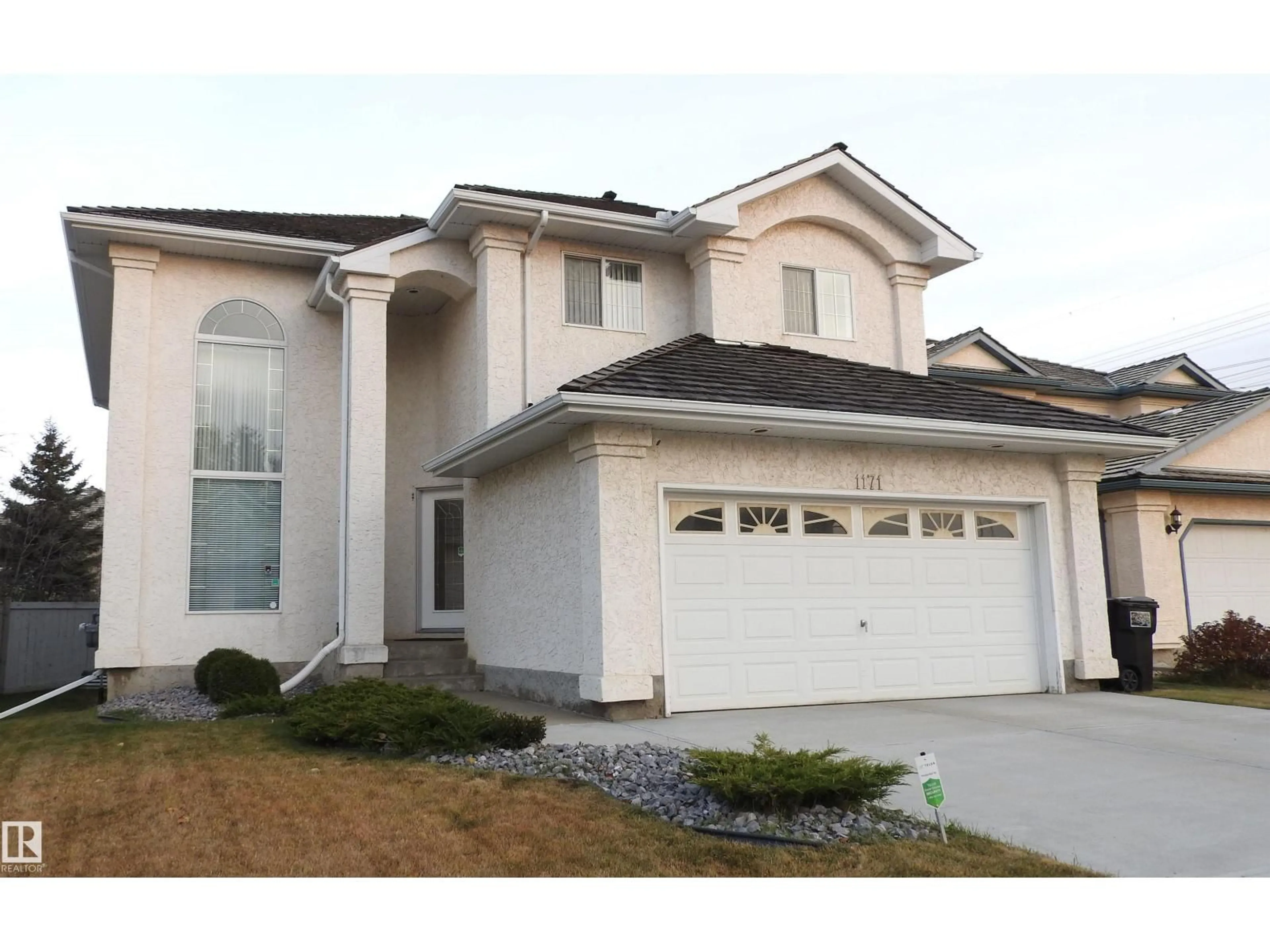 Home with vinyl exterior material, street for 1171 CARTER CREST RD, Edmonton Alberta T6R2L8