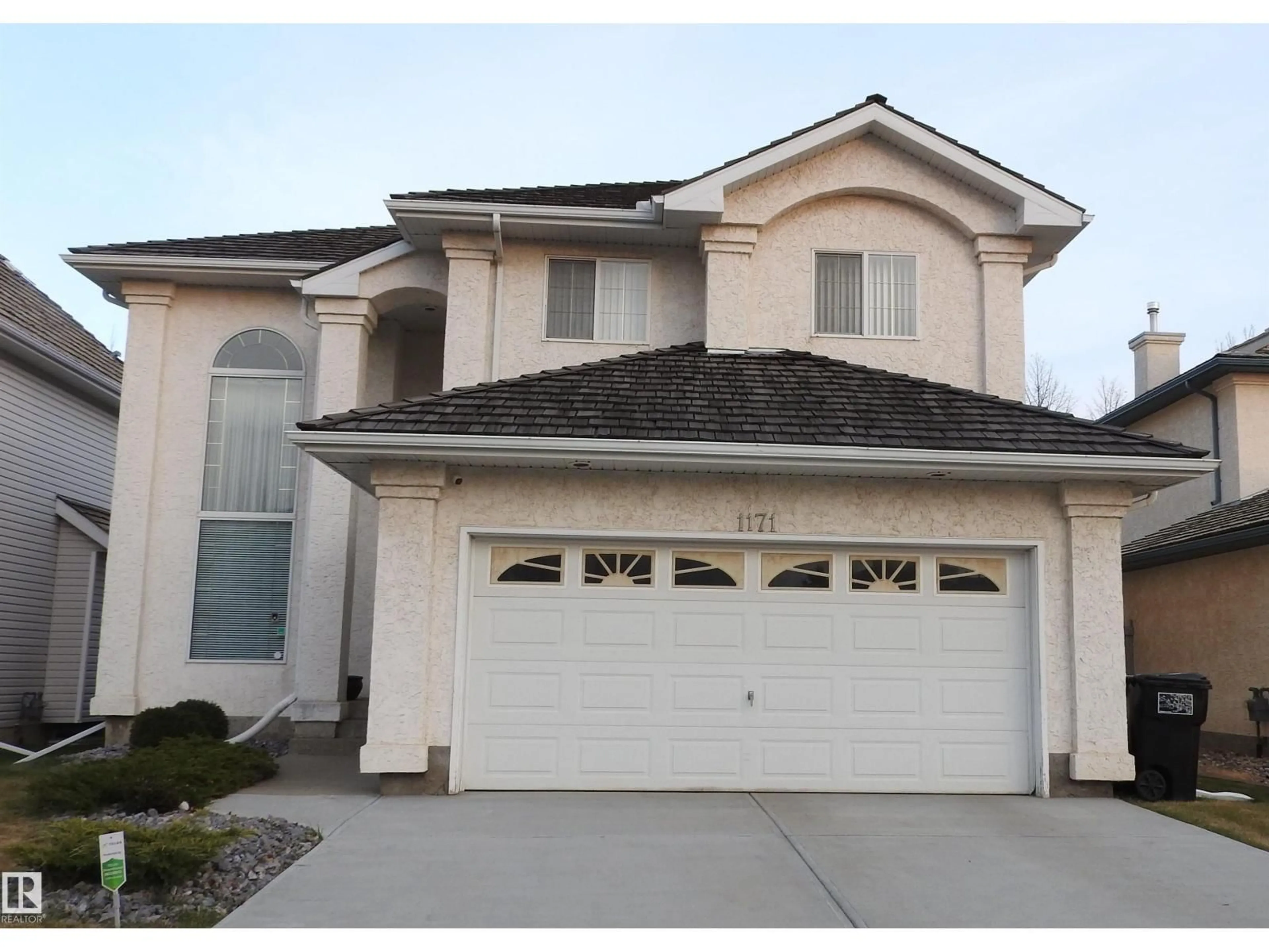 Home with vinyl exterior material, street for 1171 CARTER CREST RD, Edmonton Alberta T6R2L8