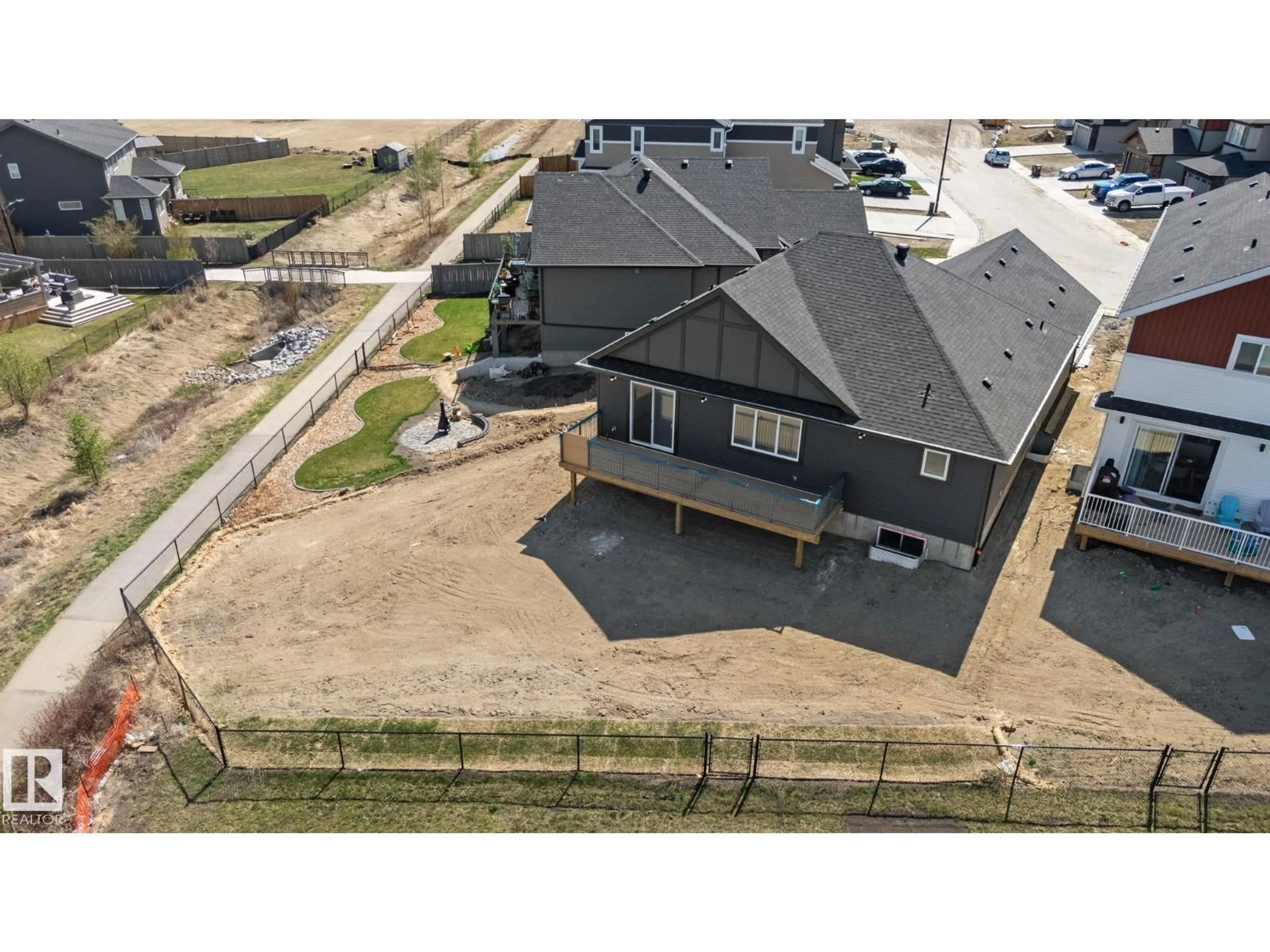 A pic from outside/outdoor area/front of a property/back of a property/a pic from drone, unknown for NW - 20908 128 AV, Edmonton Alberta T5S0R6