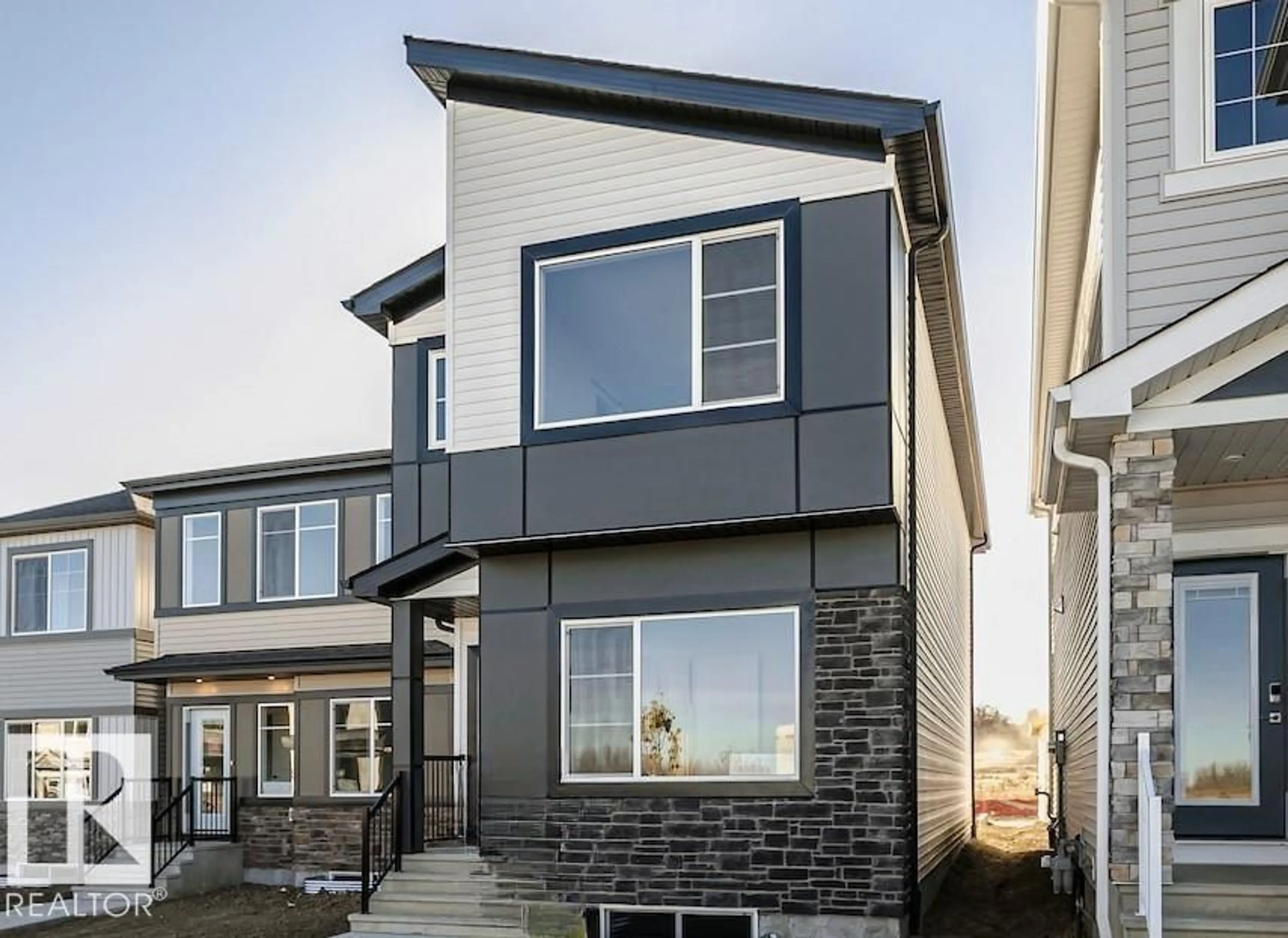 Home with vinyl exterior material, street for 4299 KINGLET DR, Edmonton Alberta T5S2C2