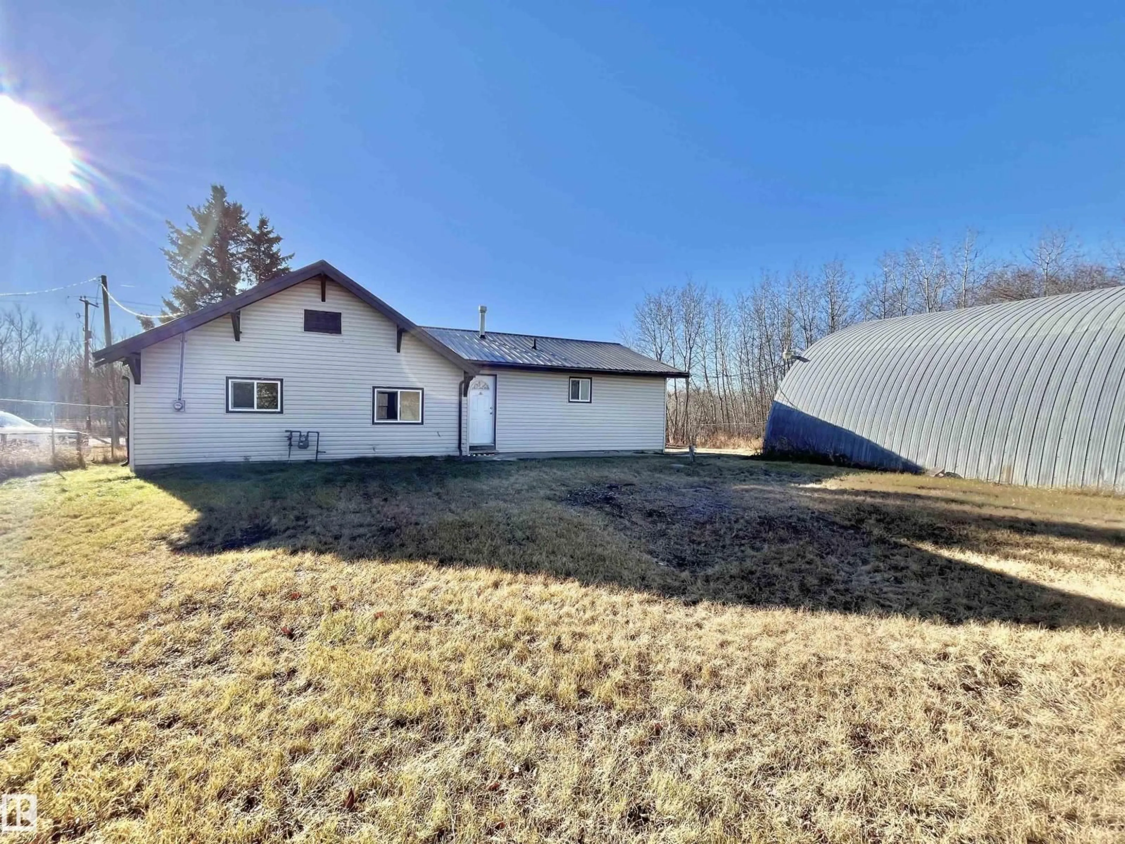 A pic from outside/outdoor area/front of a property/back of a property/a pic from drone, building for 66 RAILWAY AV, Duffield Alberta T0E0S0