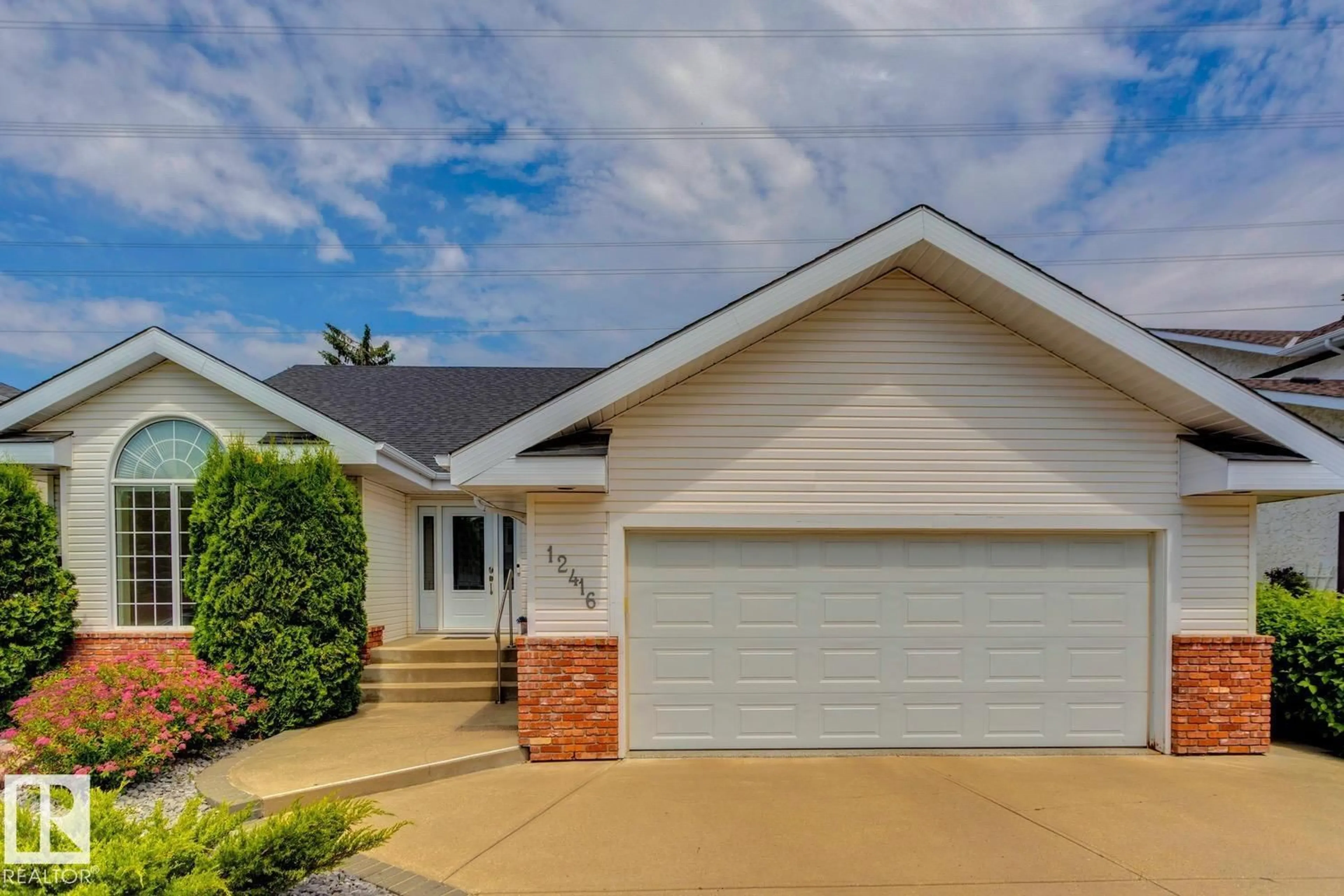 Home with vinyl exterior material, street for 12416 29A AV, Edmonton Alberta T6J6C6