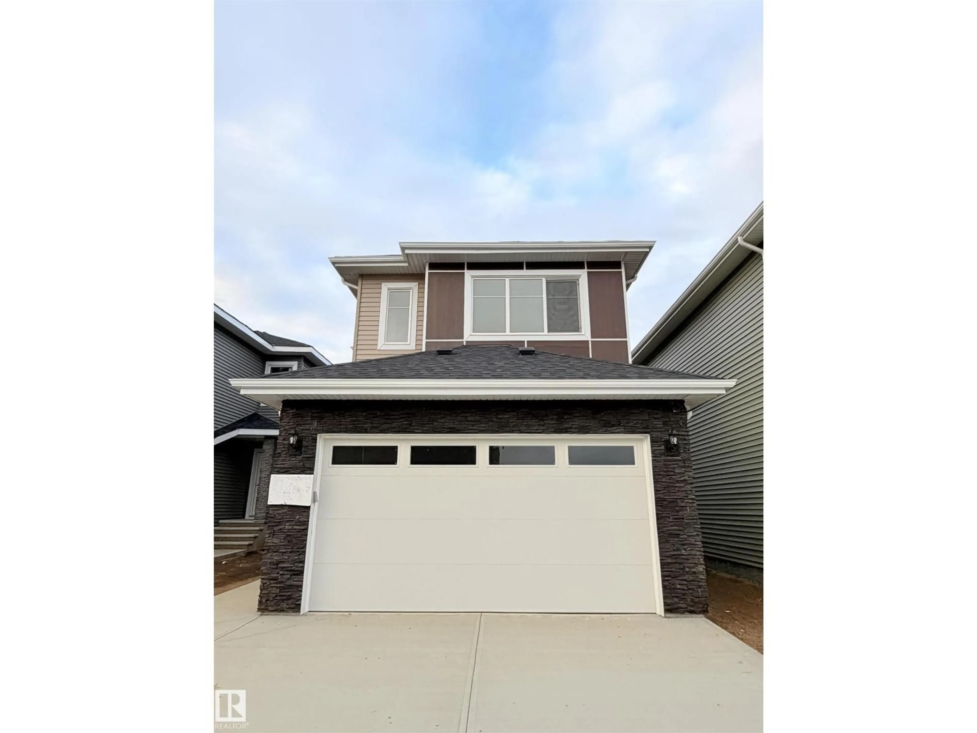 Home with vinyl exterior material, street for 3152 MAGPIE WAY, Edmonton Alberta T5S0K8