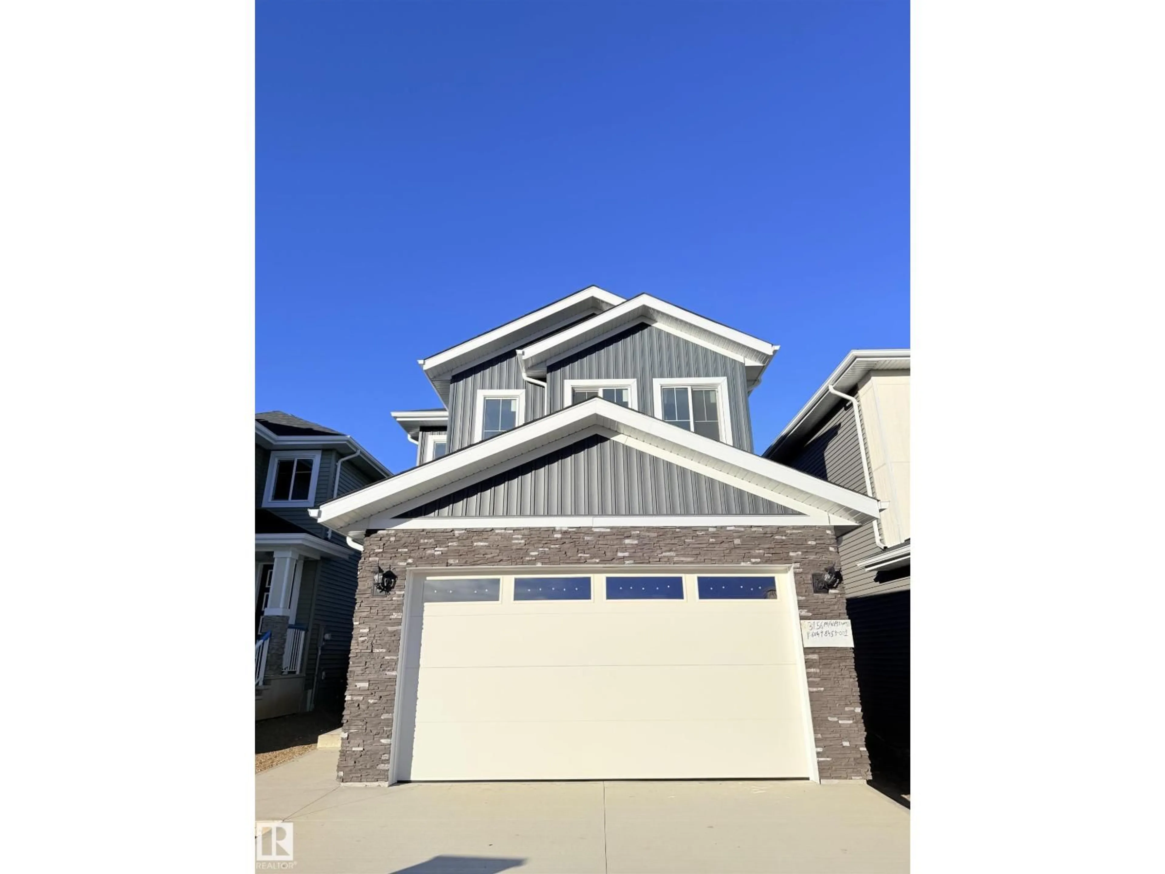 Home with vinyl exterior material, street for 3156 MAGPIE WAY, Edmonton Alberta T5S0K8