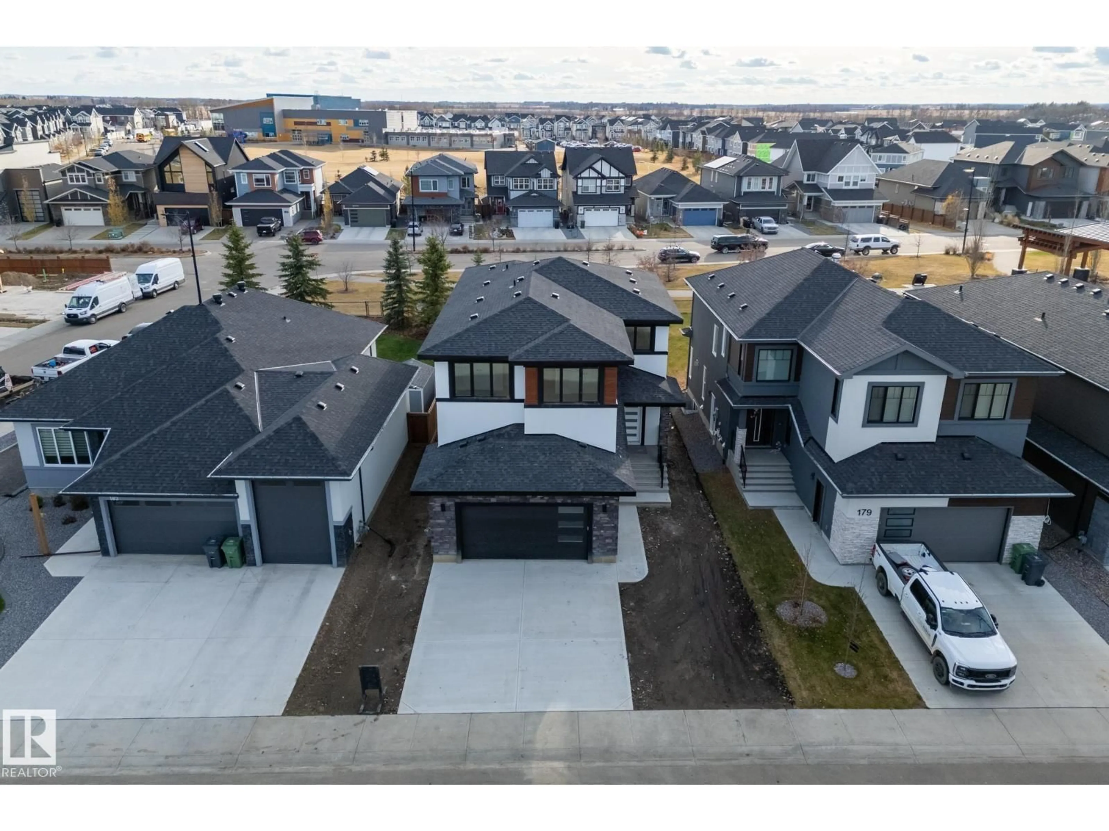A pic from outside/outdoor area/front of a property/back of a property/a pic from drone, street for 181 EDGEWATER CI, Leduc Alberta T9E1K5