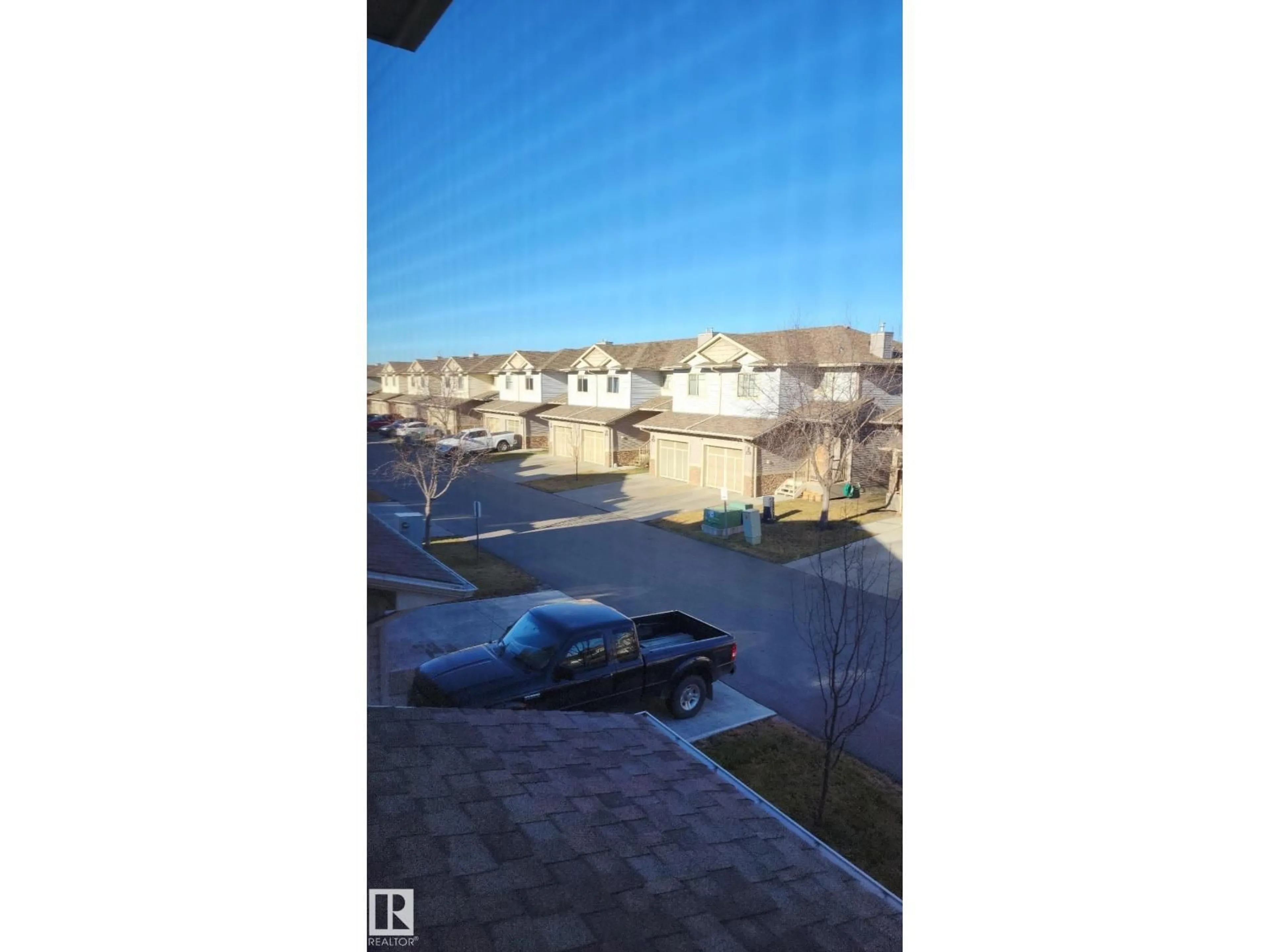 A pic from outside/outdoor area/front of a property/back of a property/a pic from drone, unknown for #107 - 5420 GRANT MACEWAN BV, Leduc Alberta T9E0M1