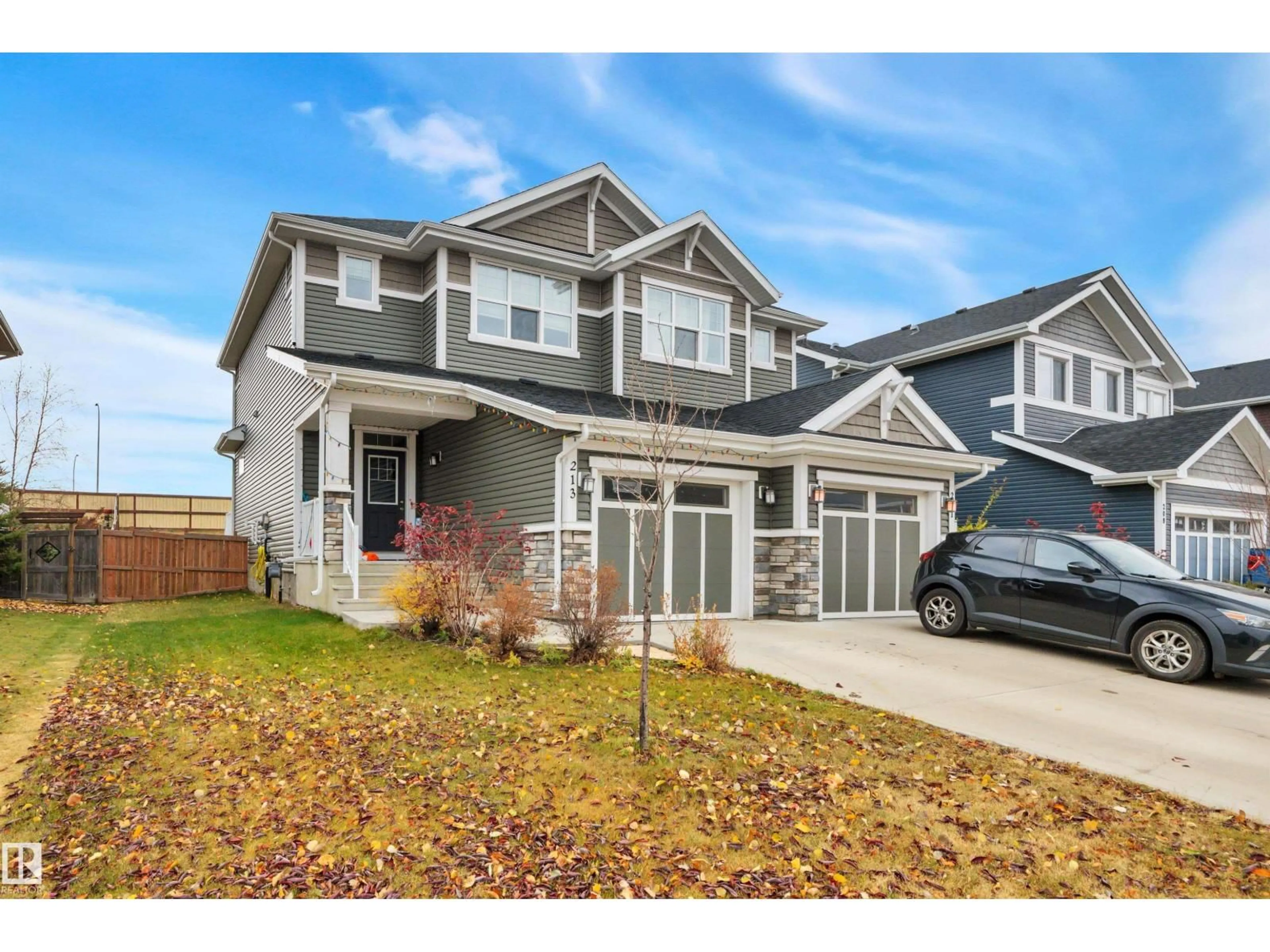 Home with vinyl exterior material, street for 213 STURTZ BN, Leduc Alberta T9E0Y6