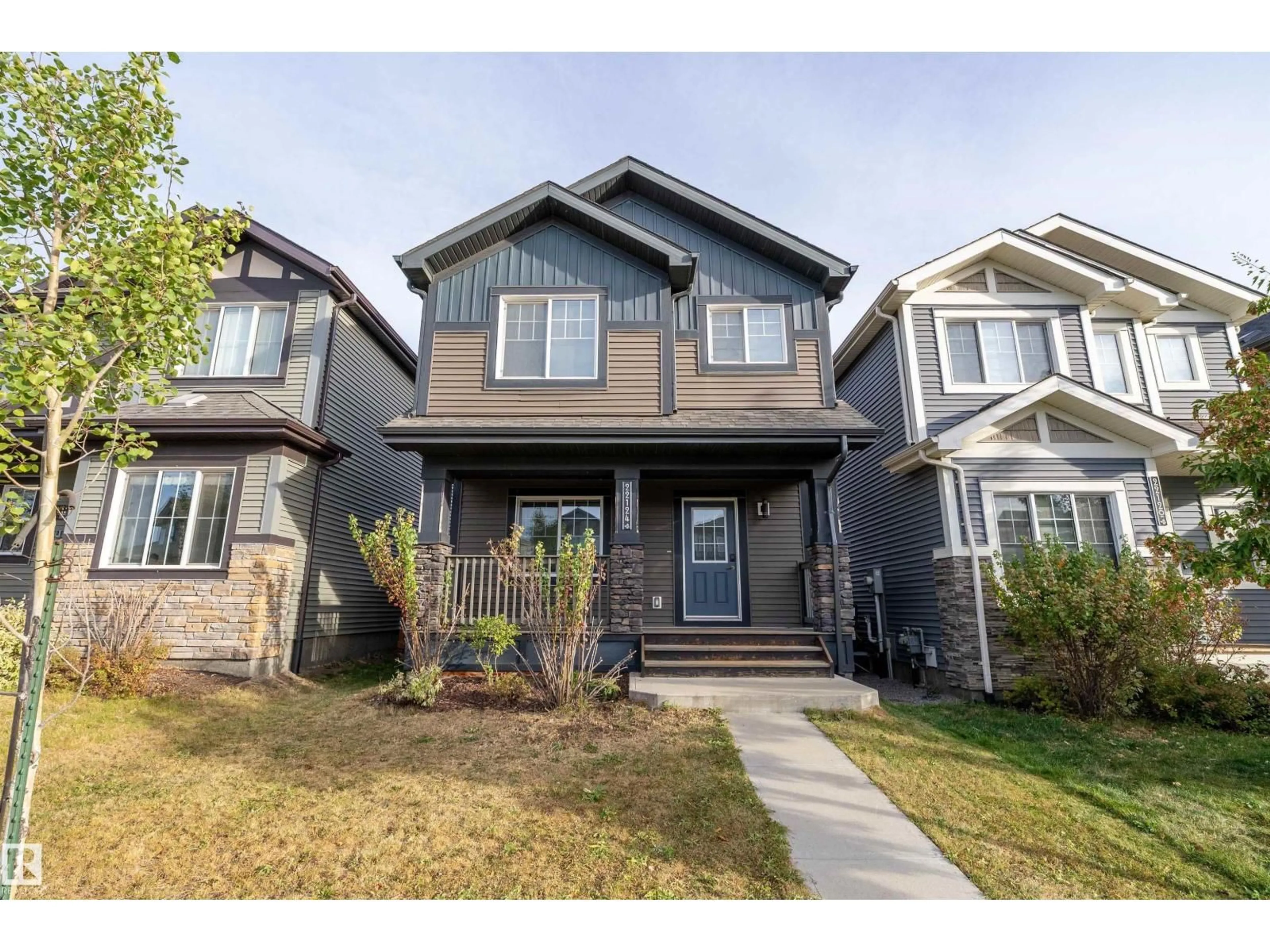 Home with vinyl exterior material, street for NW - 22124 87 AV, Edmonton Alberta T5T7H7