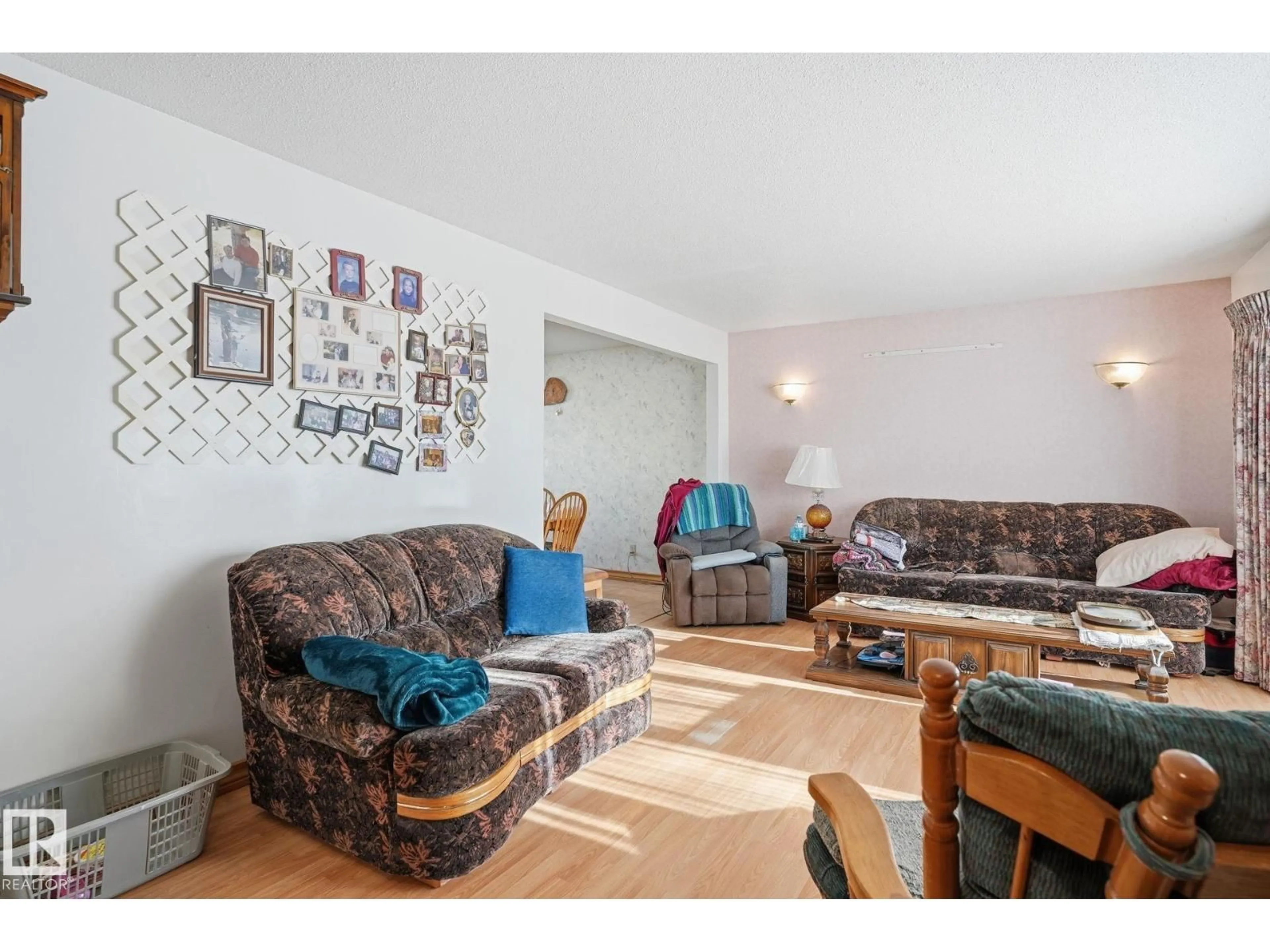 Living room with furniture, unknown for 5802 42 AVE, Camrose Alberta T4V2S1