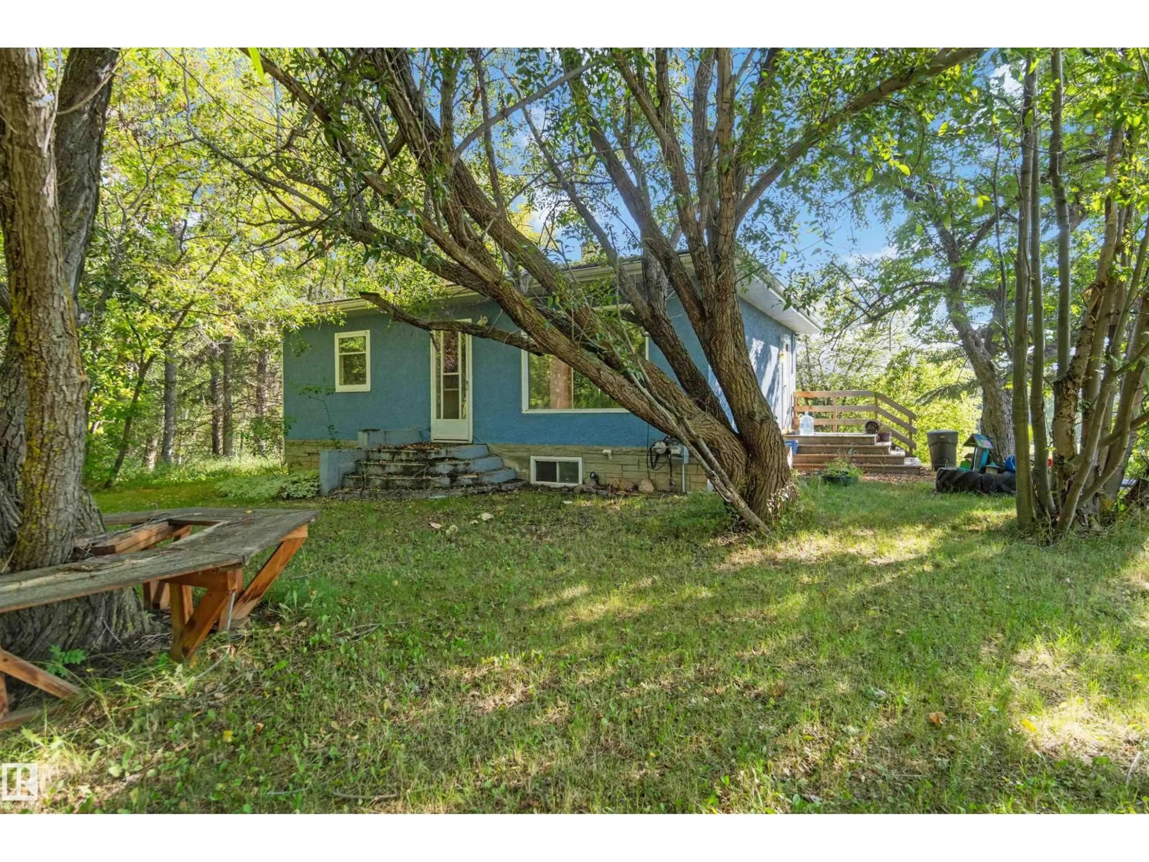 A pic from outside/outdoor area/front of a property/back of a property/a pic from drone, forest/trees view for 56313 RGE ROAD 62, Rural Lac Ste. Anne County Alberta T0E2A0