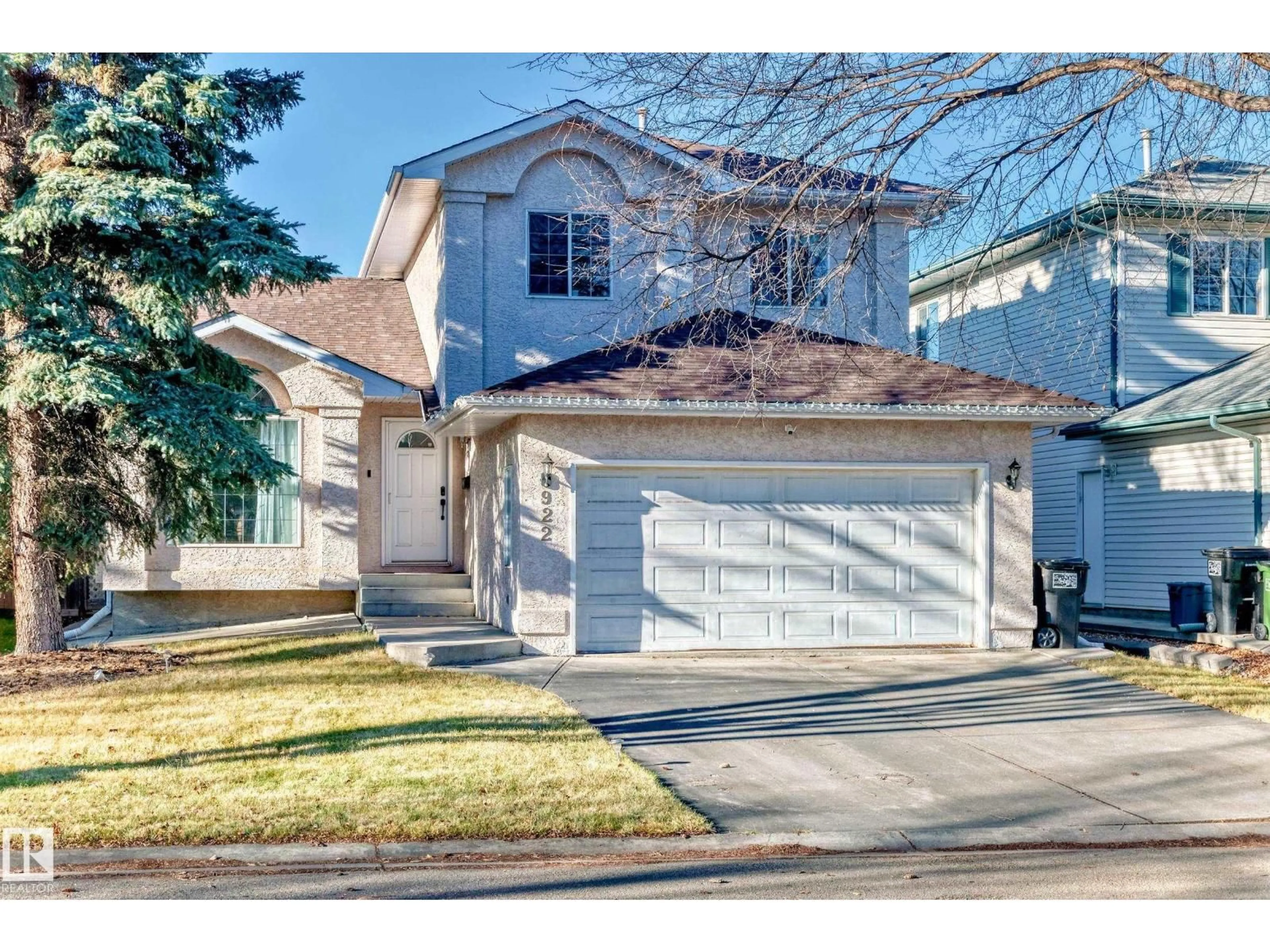Home with vinyl exterior material, street for 922 BURROWS CR, Edmonton Alberta T6R2L3