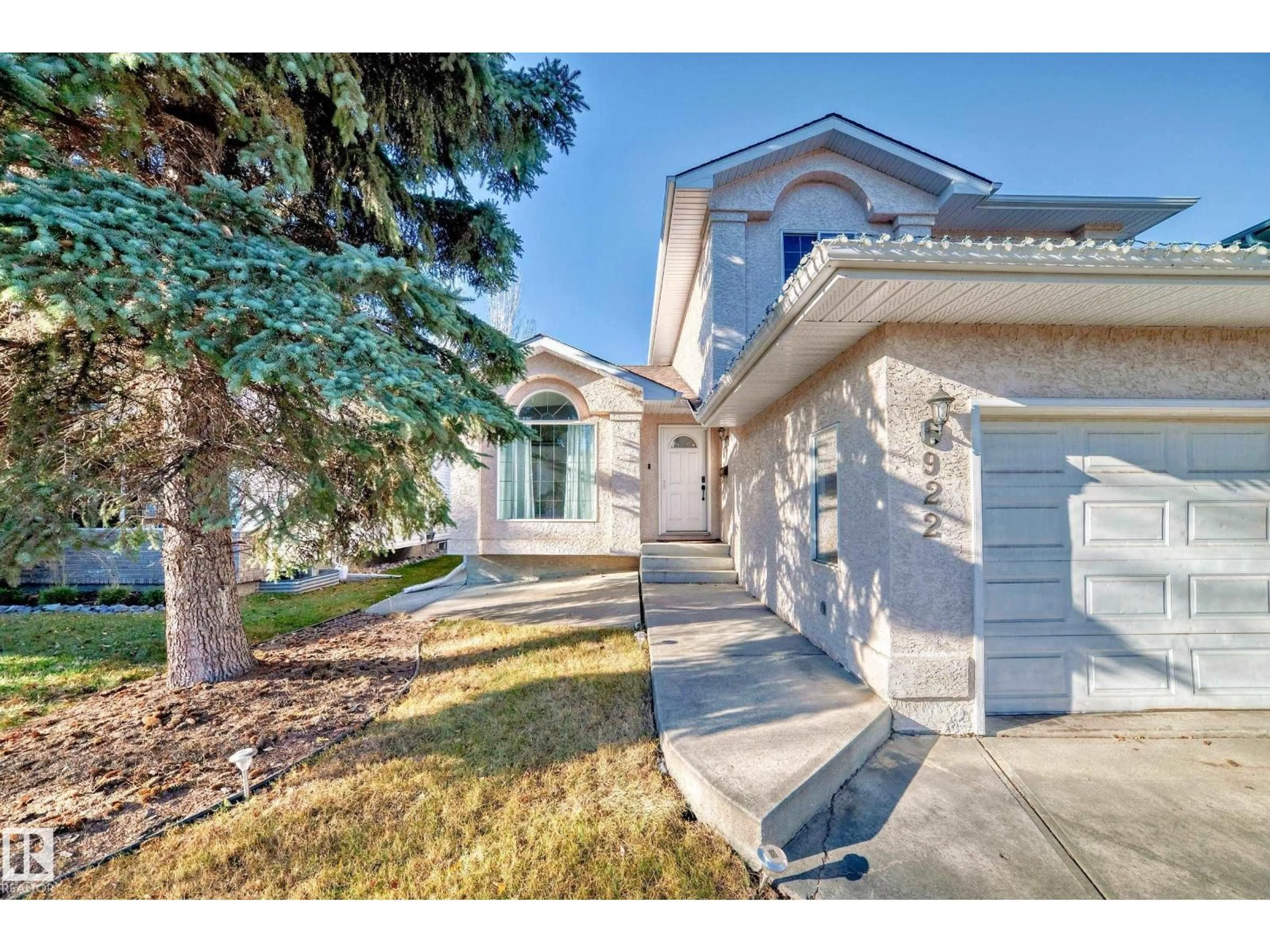 Home with vinyl exterior material, street for 922 BURROWS CR, Edmonton Alberta T6R2L3