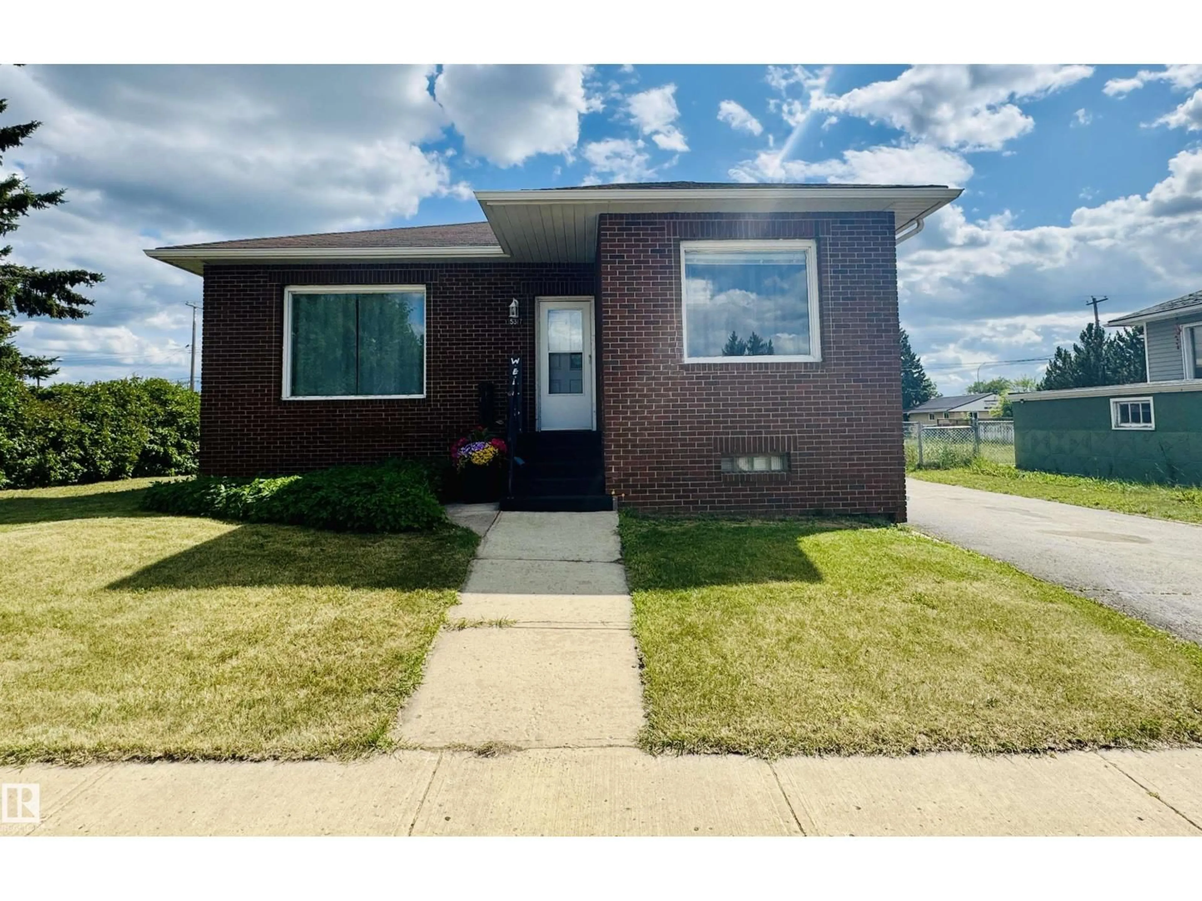 Home with brick exterior material, street for 5317 51 AV, St. Paul Town Alberta T0A3A1