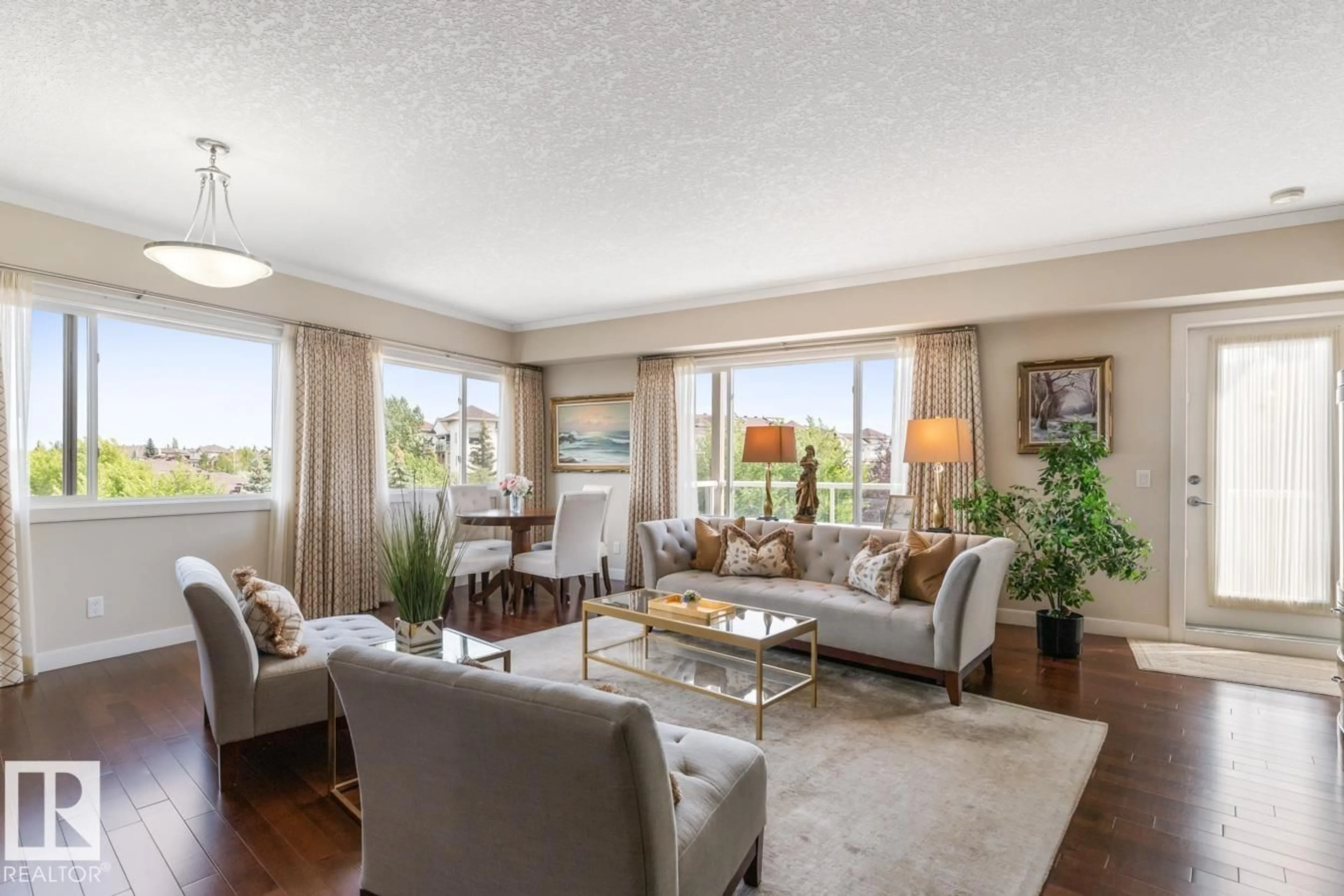 Living room with furniture, wood/laminate floor for 308 CRYSTAL LN, Sherwood Park Alberta T8H0P2