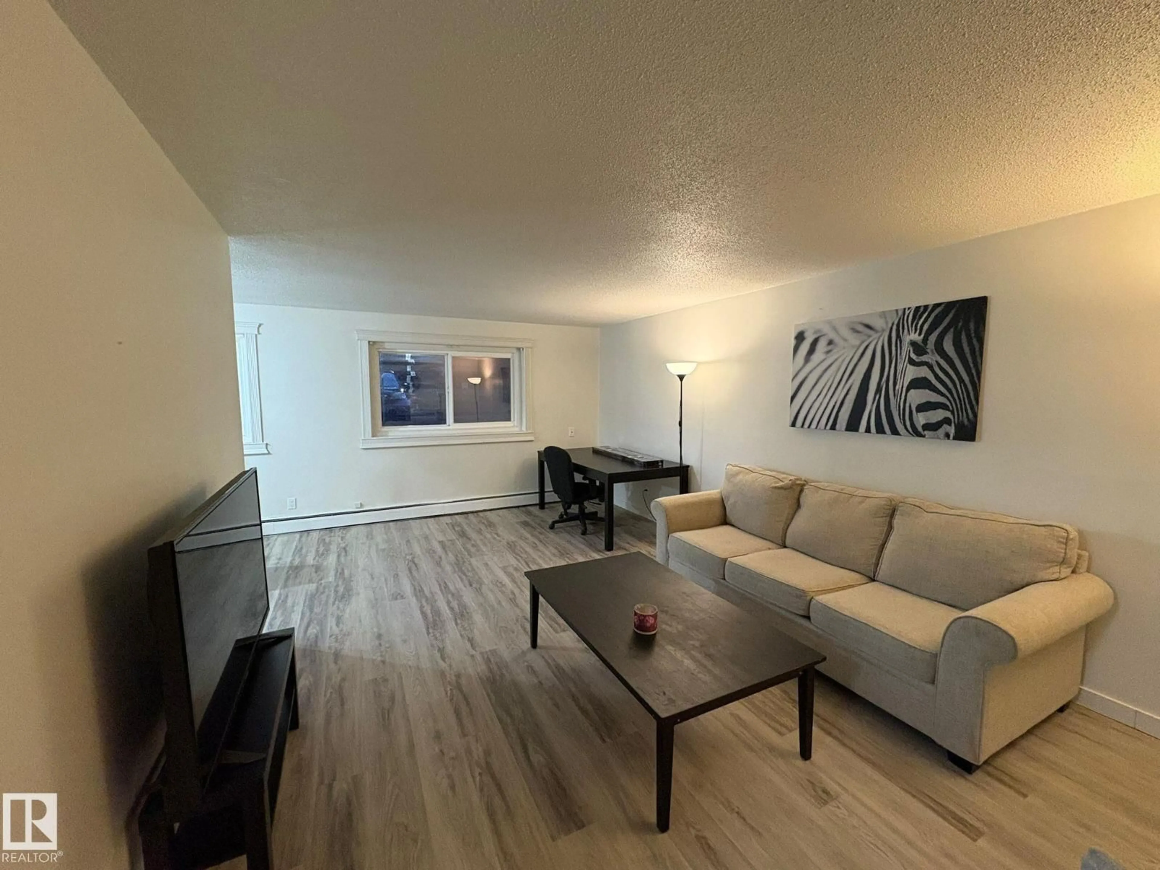 A pic of a room for #107 - 7204 81 AV, Edmonton Alberta T6B0E2