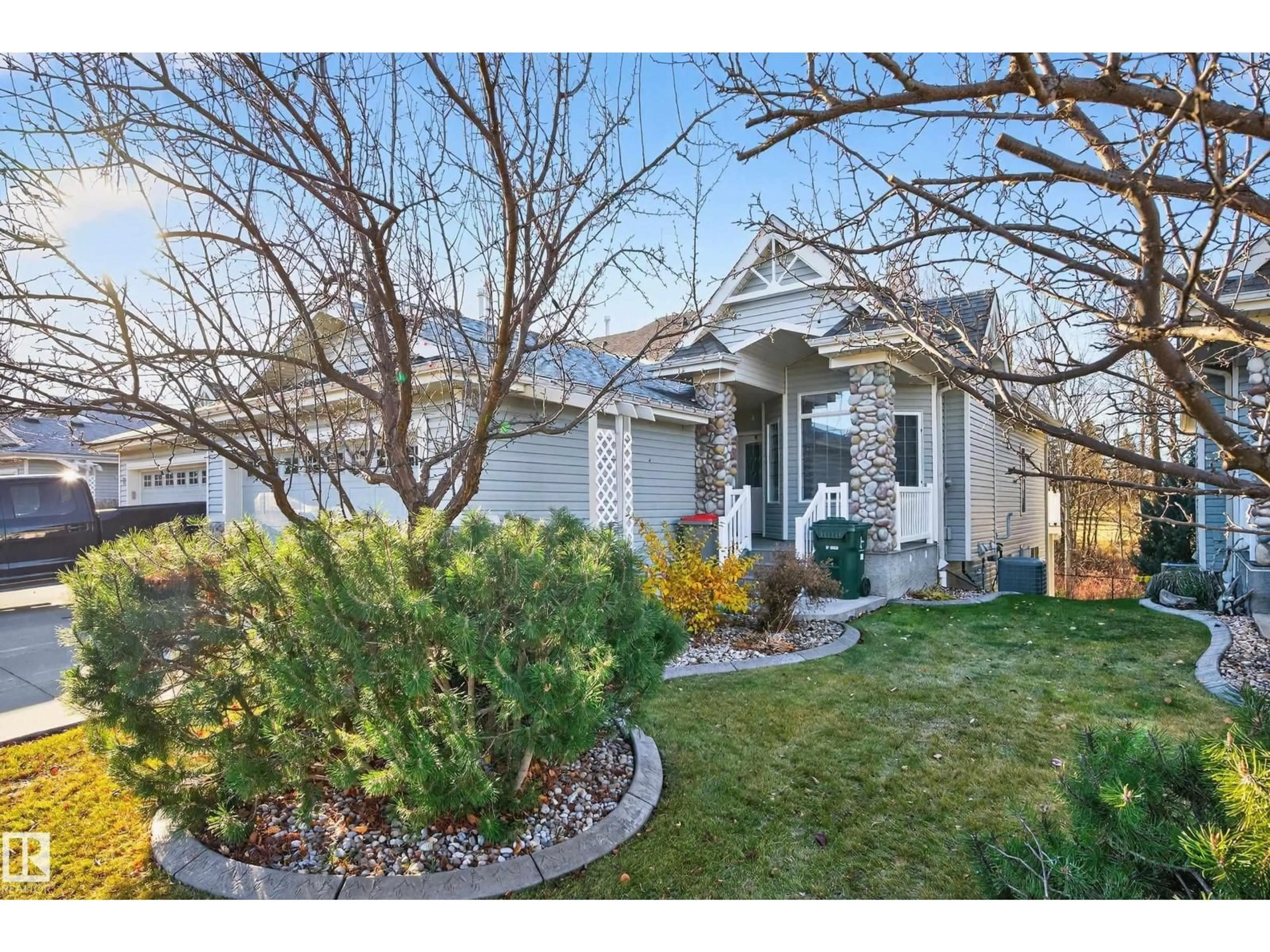 Home with vinyl exterior material, street for 18 BRIARWOOD VG, Stony Plain Alberta T7Z2R4