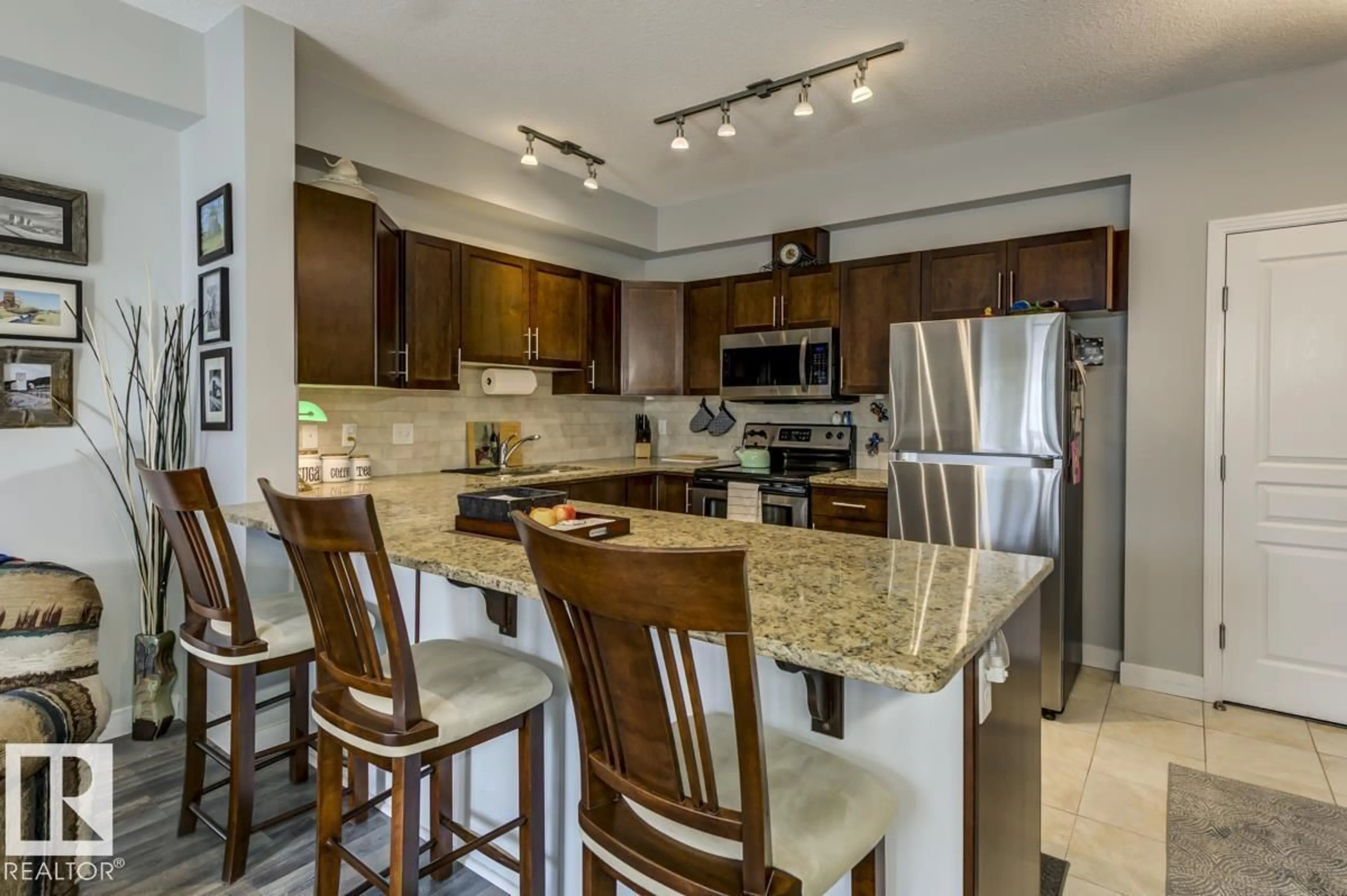 Open concept kitchen, ceramic/tile floor for #322 - 2035 GRANTHAM CO, Edmonton Alberta T5T3X4
