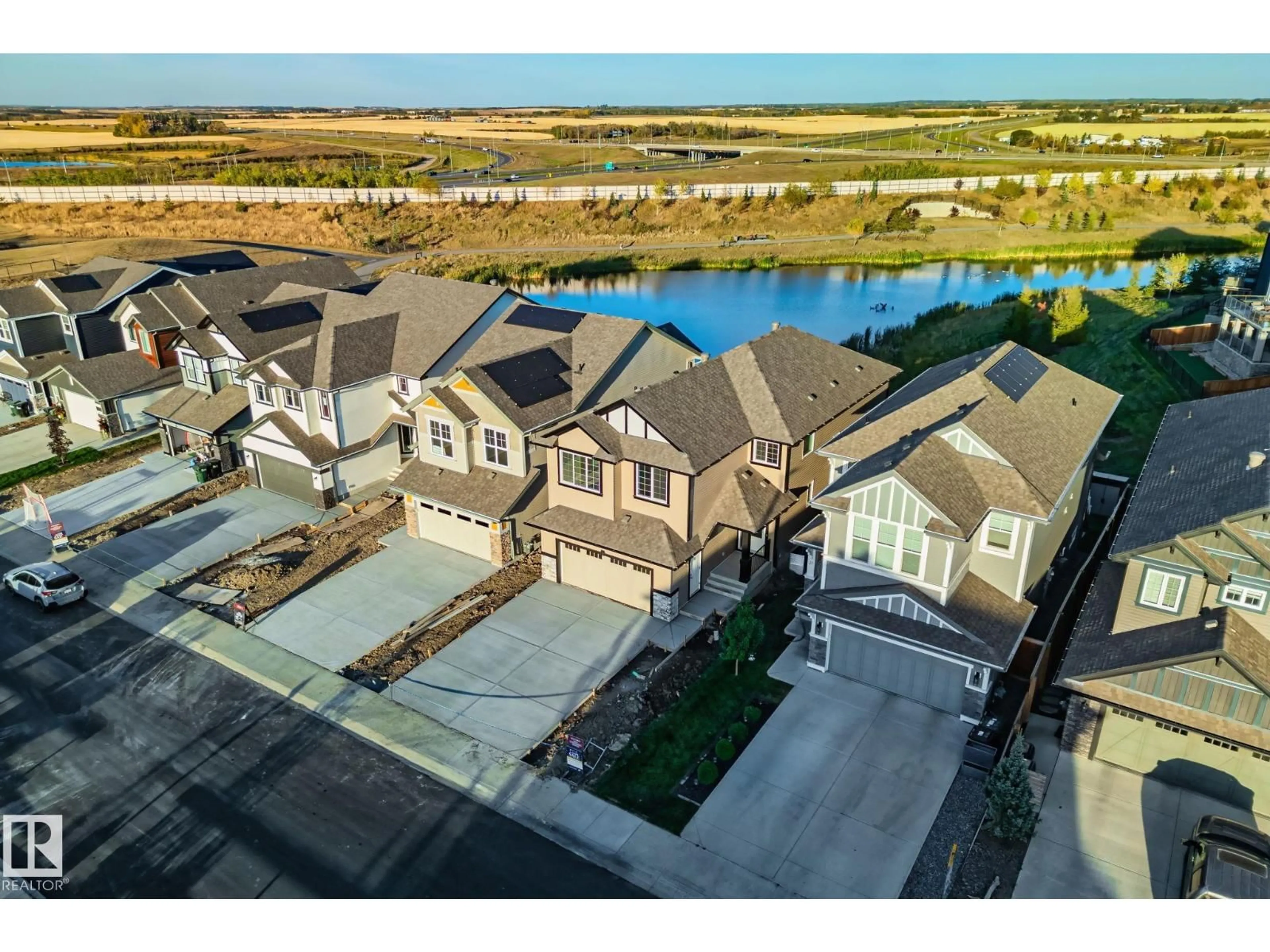 A pic from outside/outdoor area/front of a property/back of a property/a pic from drone, water/lake/river/ocean view for 41 SAVOY CR, Sherwood Park Alberta T8H2Y3