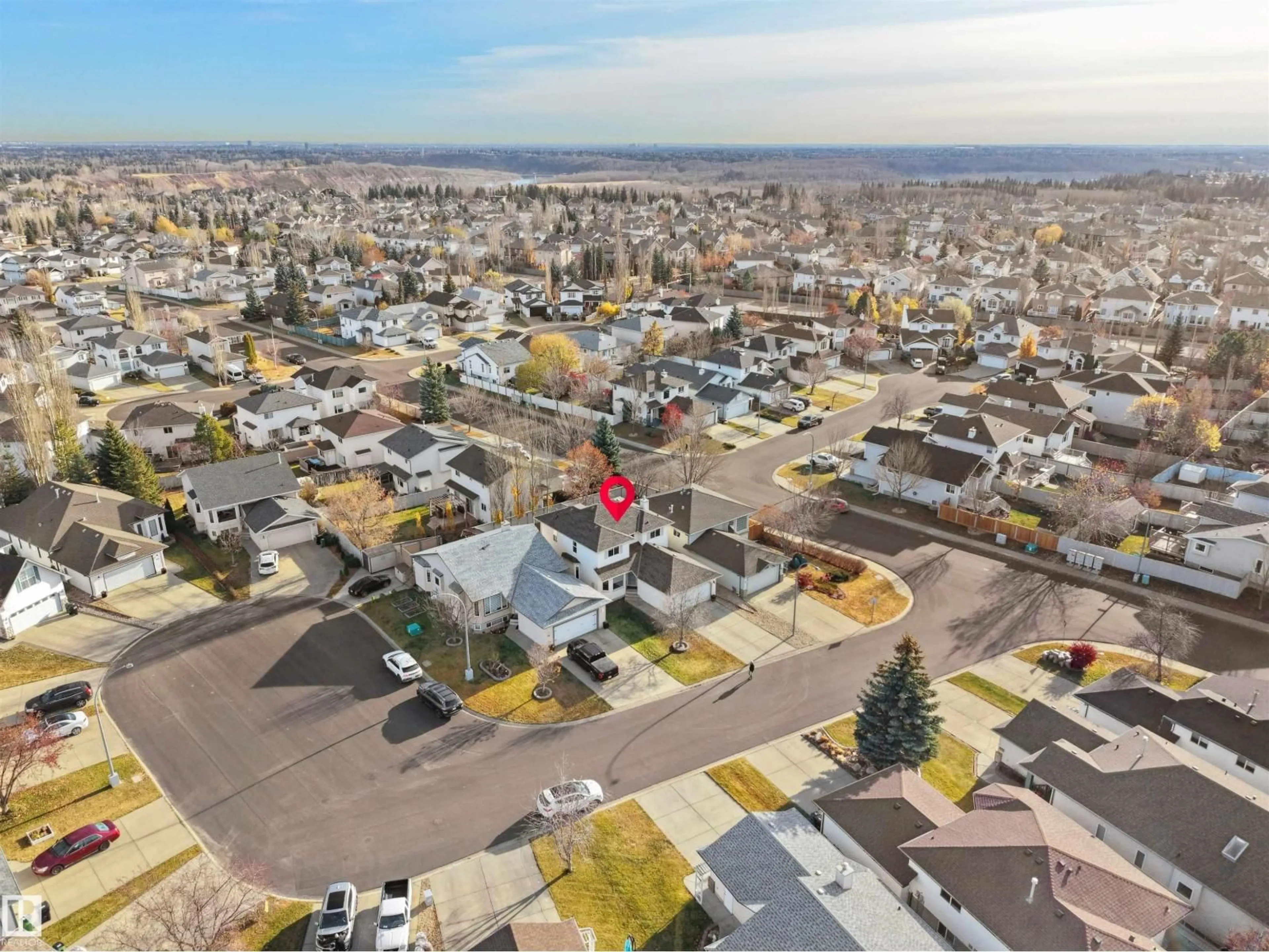 A pic from outside/outdoor area/front of a property/back of a property/a pic from drone, street for 94 DECHENE RD, Edmonton Alberta T6M2S4
