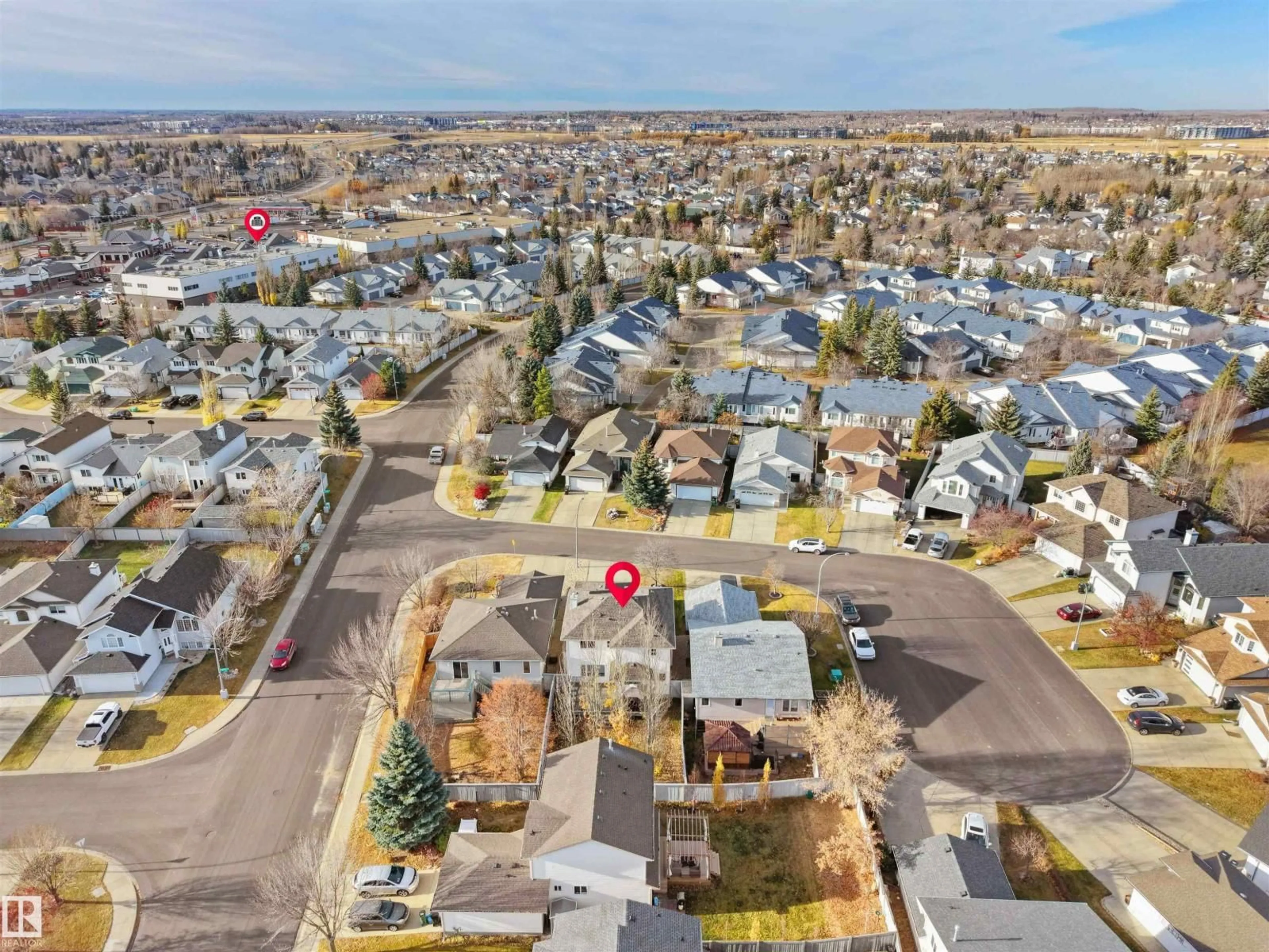 A pic from outside/outdoor area/front of a property/back of a property/a pic from drone, street for 94 DECHENE RD, Edmonton Alberta T6M2S4