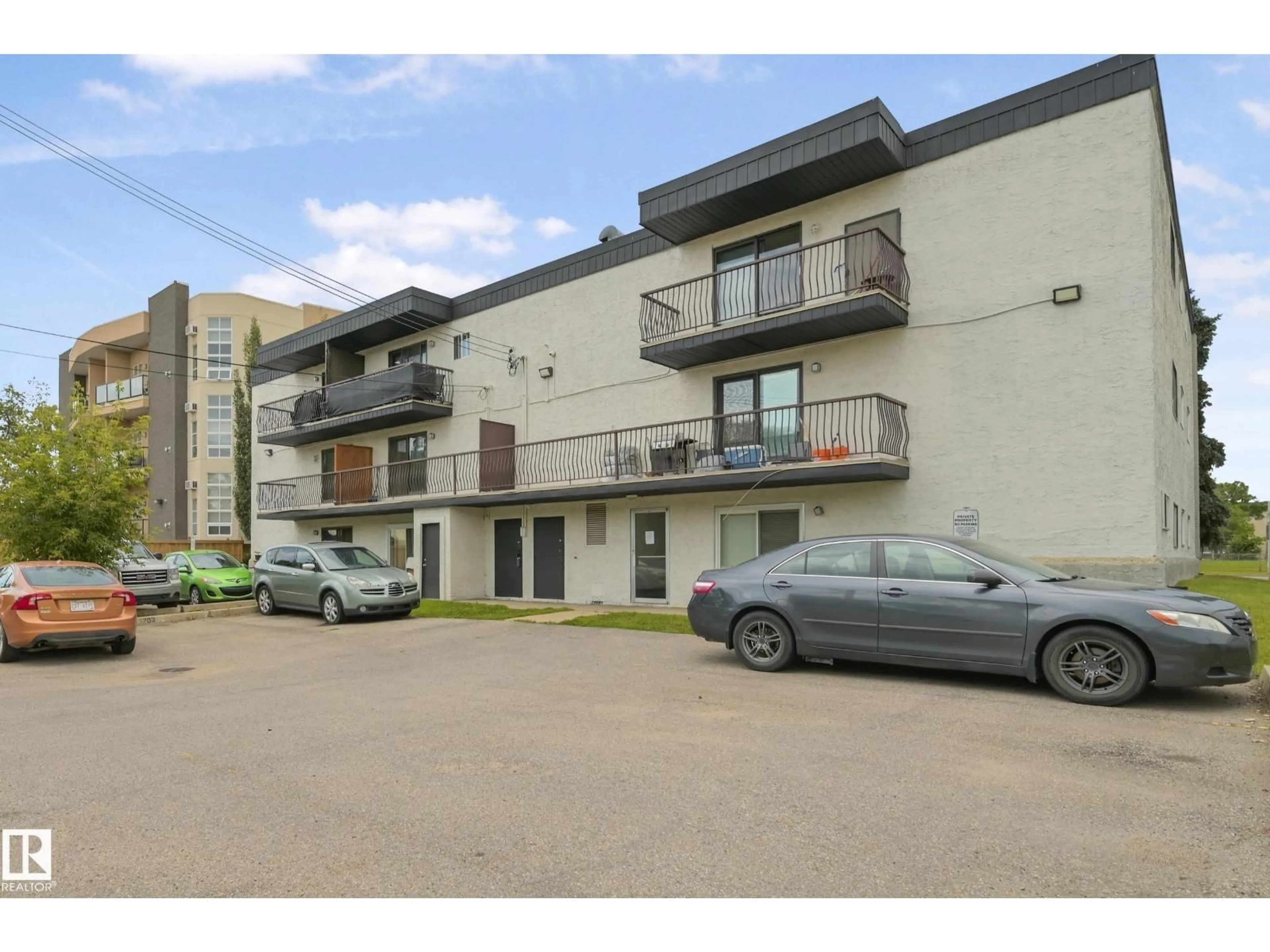 A pic from outside/outdoor area/front of a property/back of a property/a pic from drone, street for 205 10917 109 ST NW, Edmonton Alberta T5H3C2