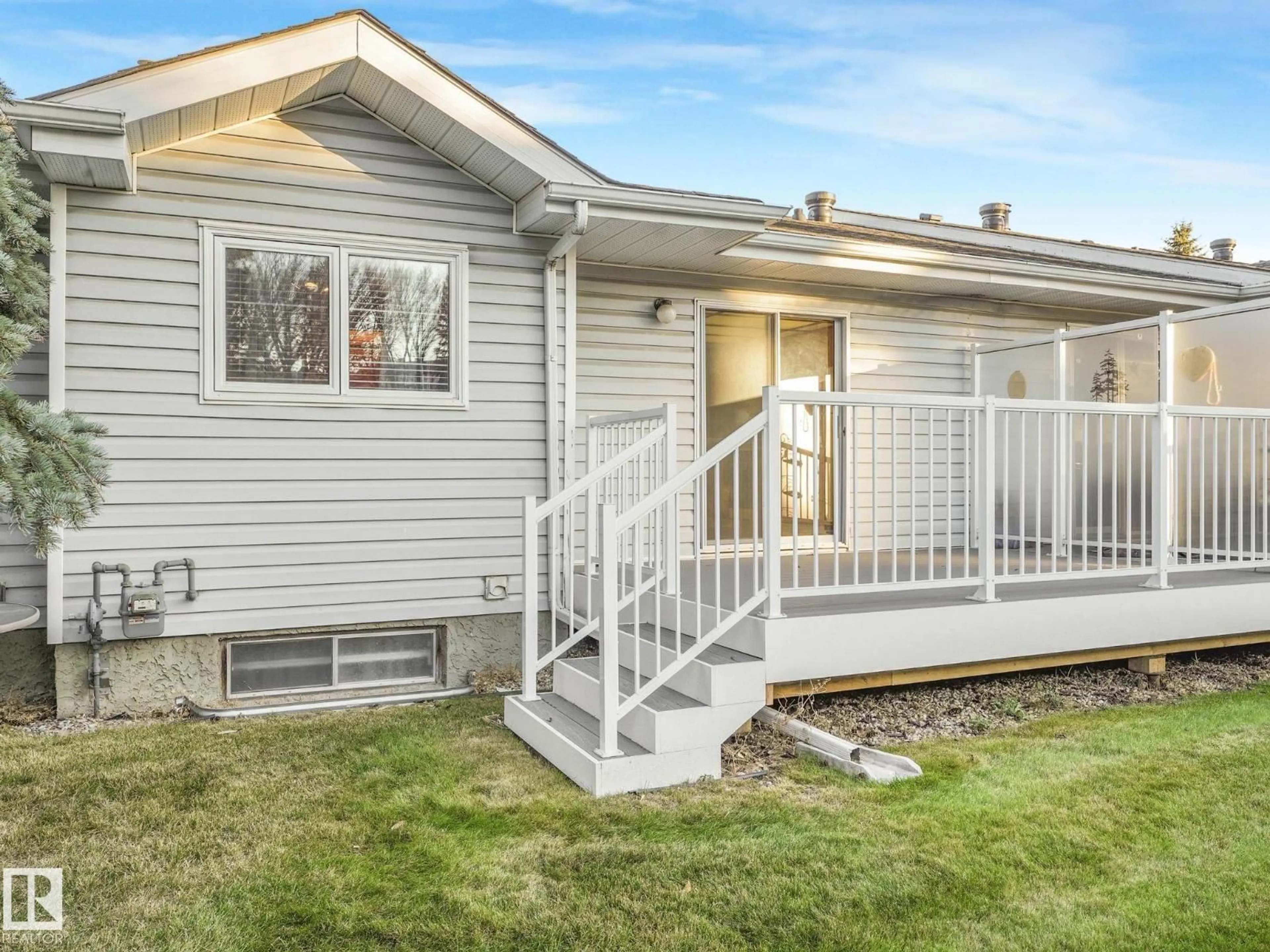 Home with vinyl exterior material, street for 17526 CALLINGWOOD RD, Edmonton Alberta T5T5P1