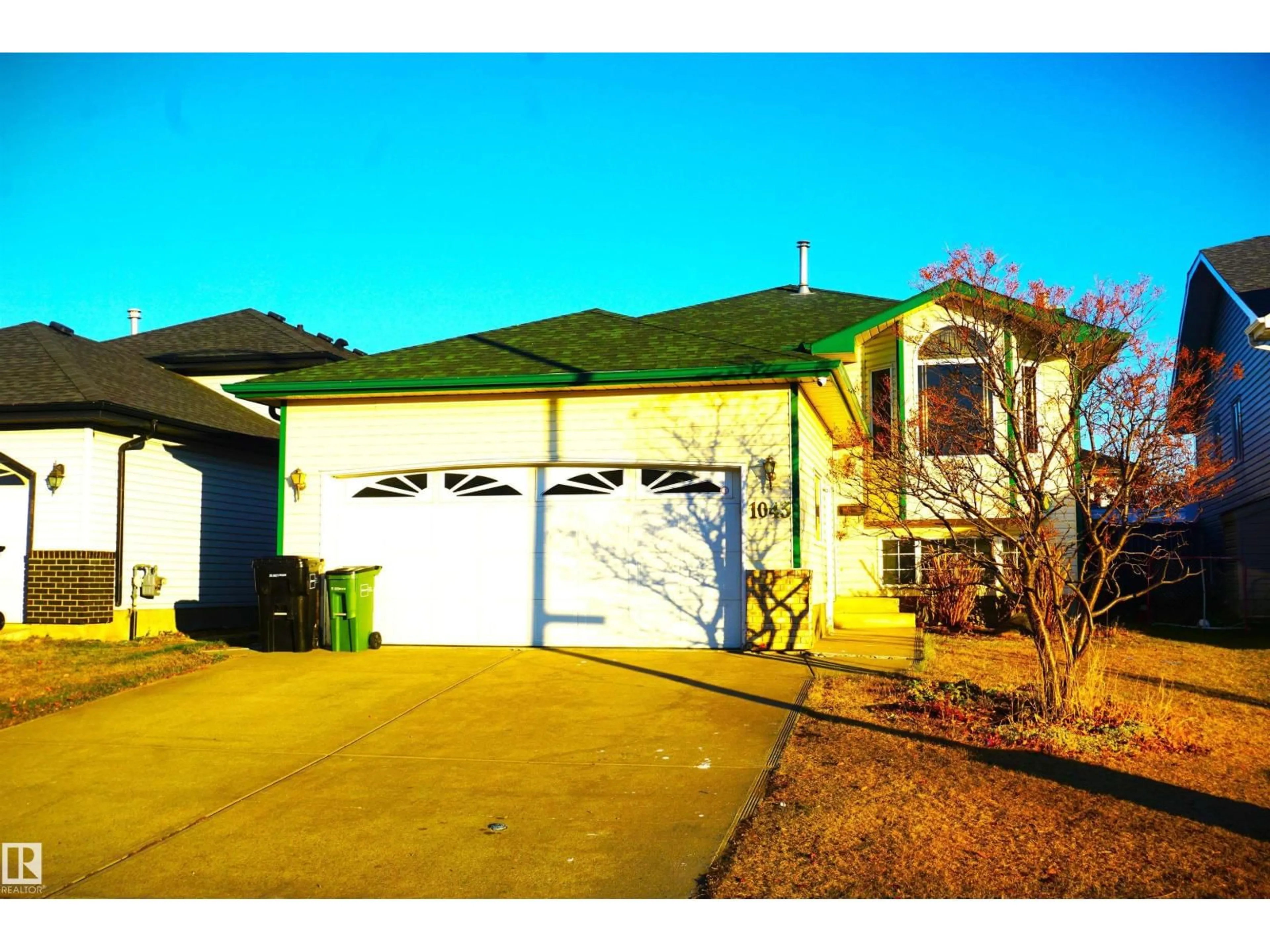Home with vinyl exterior material, street for 1043 JONES CR, Edmonton Alberta T6L6Y2