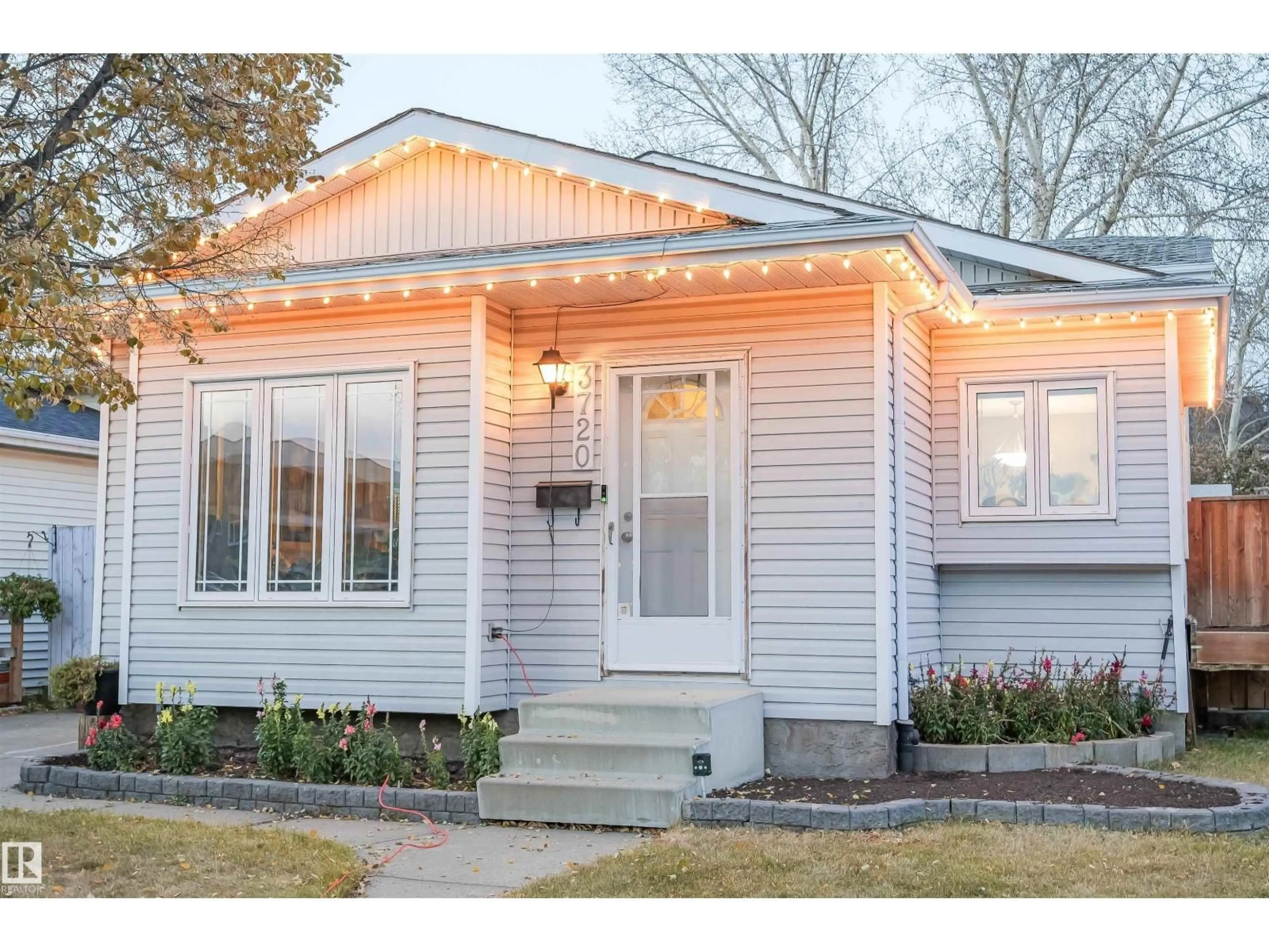 Home with vinyl exterior material, street for None - 3720 25 AV NW, Edmonton Alberta T6L4M4