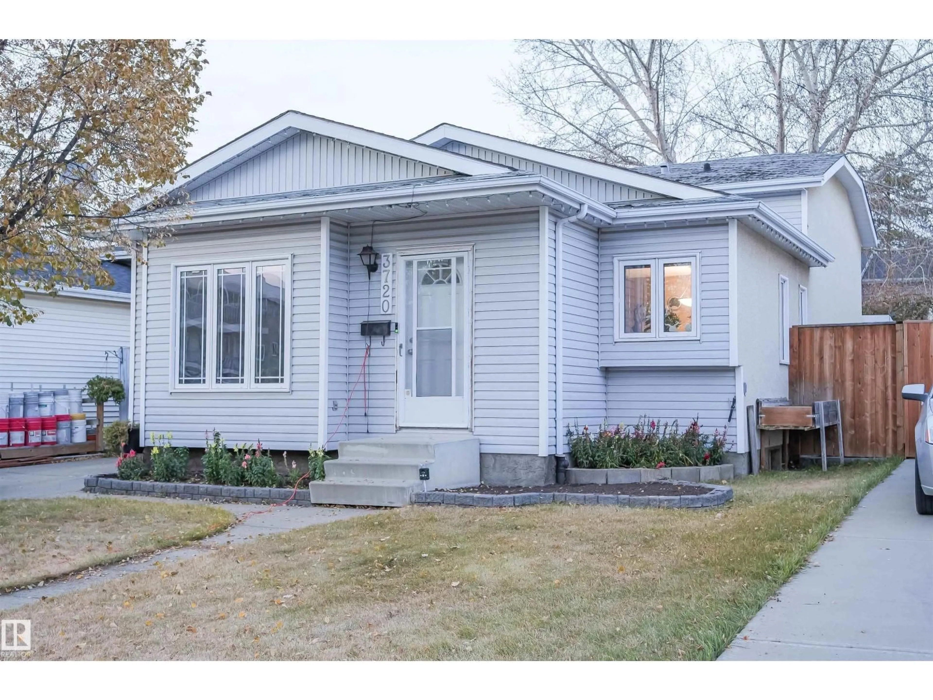 Home with vinyl exterior material, street for None - 3720 25 AV NW, Edmonton Alberta T6L4M4