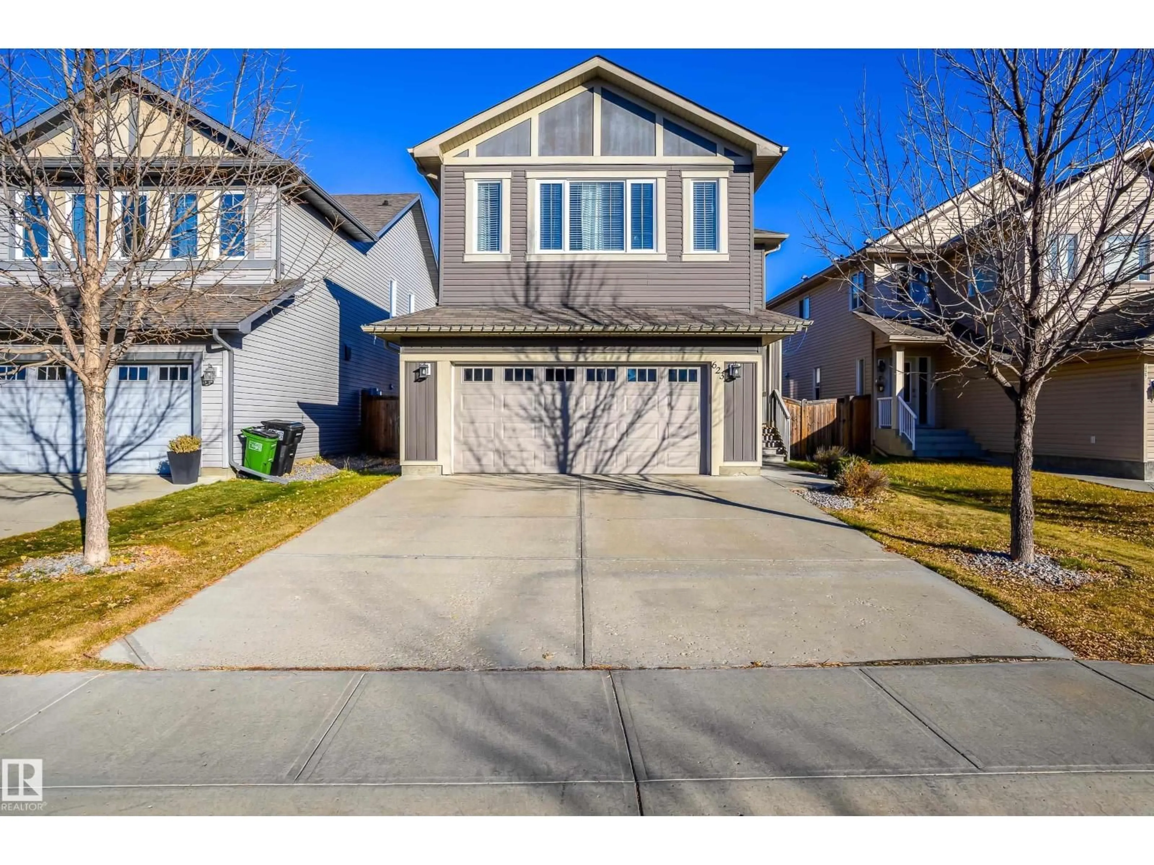 Home with vinyl exterior material, street for SW - 623 176 ST, Edmonton Alberta T6W2G7