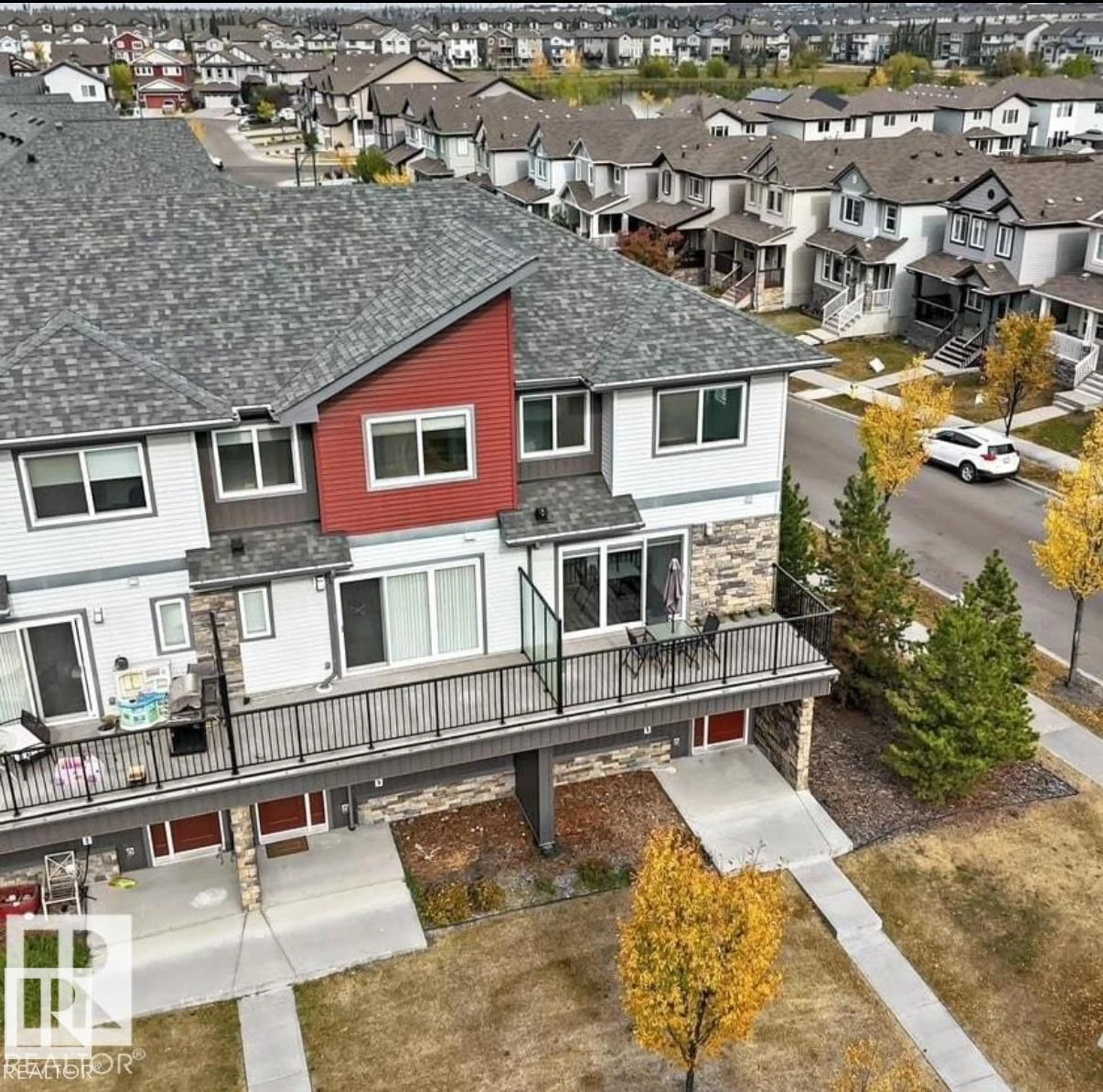A pic from outside/outdoor area/front of a property/back of a property/a pic from drone, unknown for 3330 15A AV, Edmonton Alberta T6T0Y1