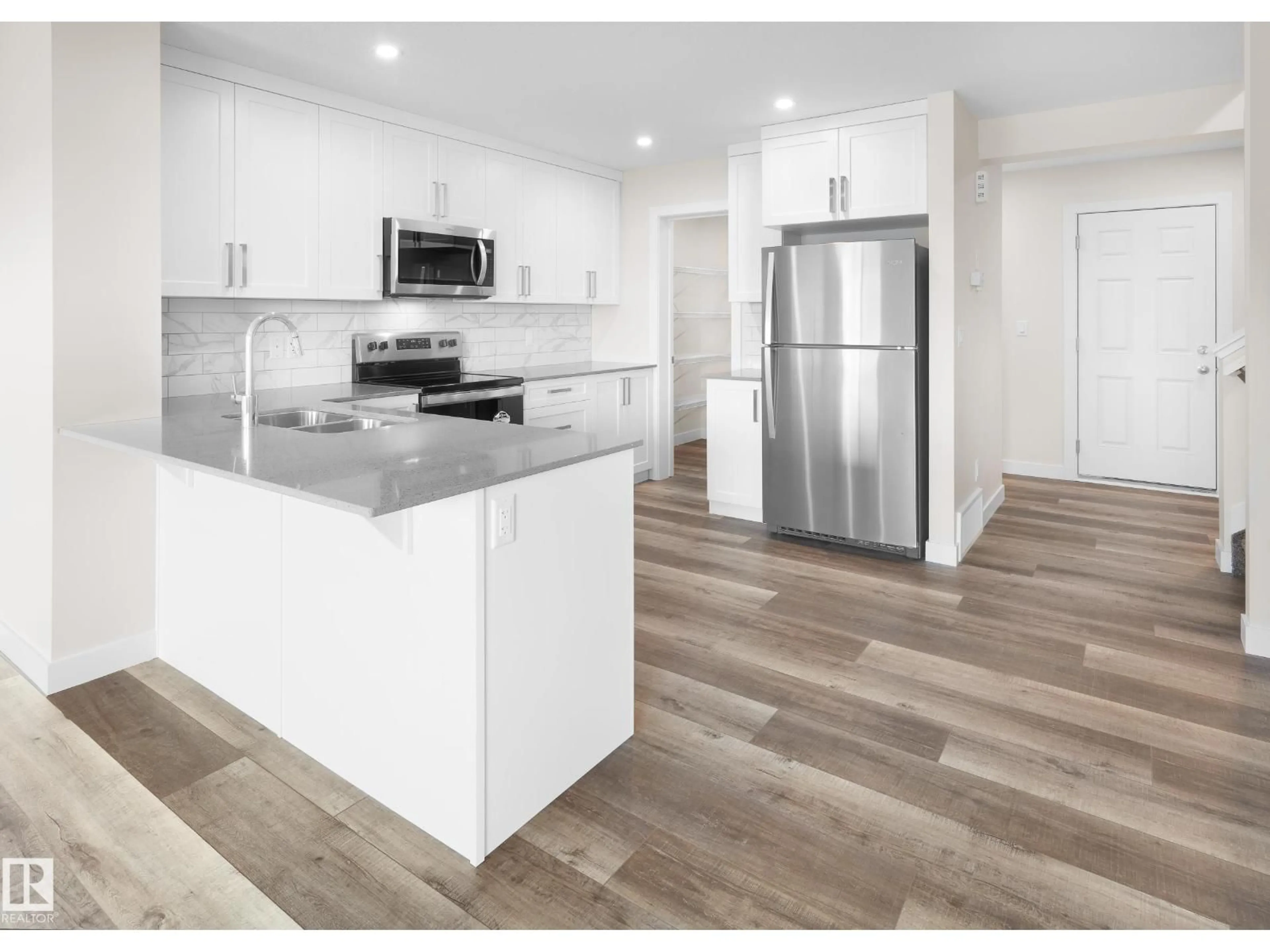 Open concept kitchen, unknown for 752 BERG LO, Leduc Alberta T9E1G8