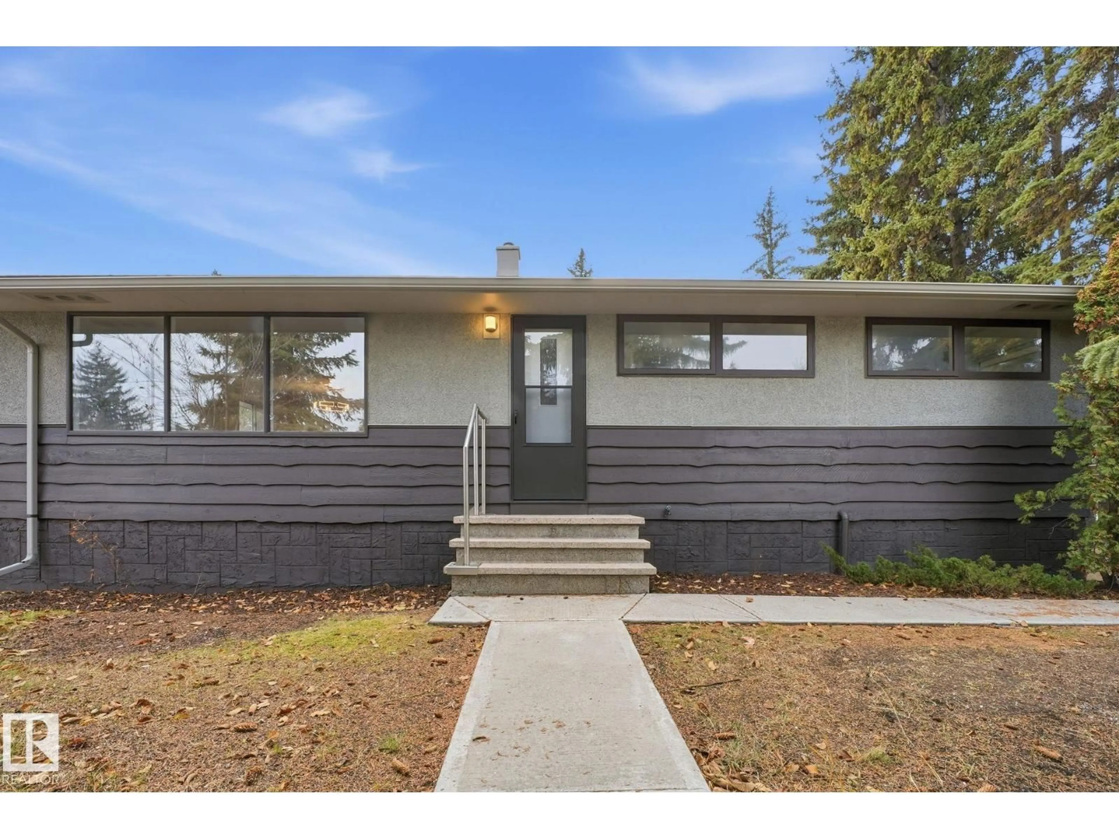 Home with vinyl exterior material, street for NW - 14719 87 AV, Edmonton Alberta T5R4E5