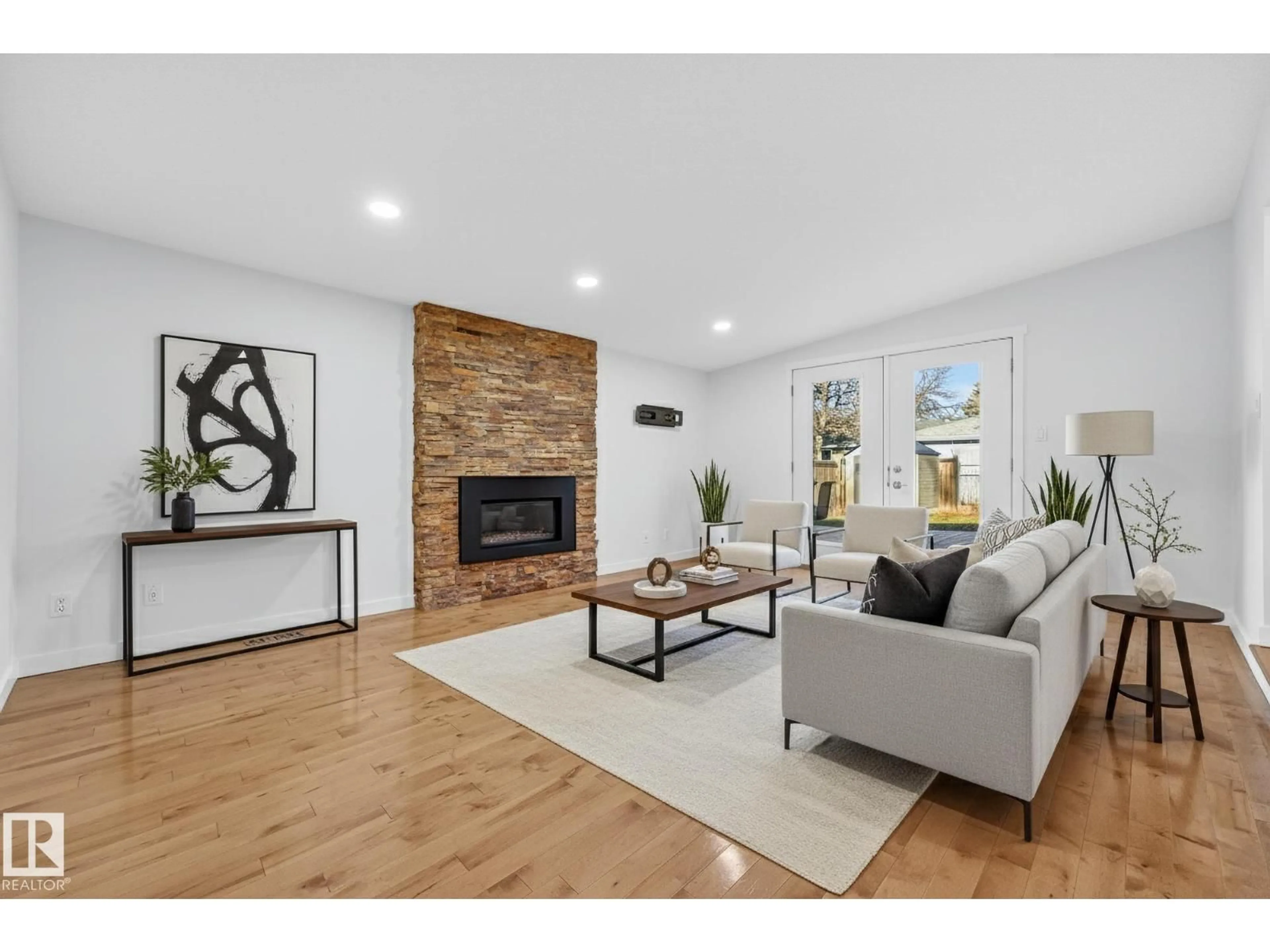 Living room with furniture, wood/laminate floor for 94 GLENWOOD CR, St. Albert Alberta T8N1X5