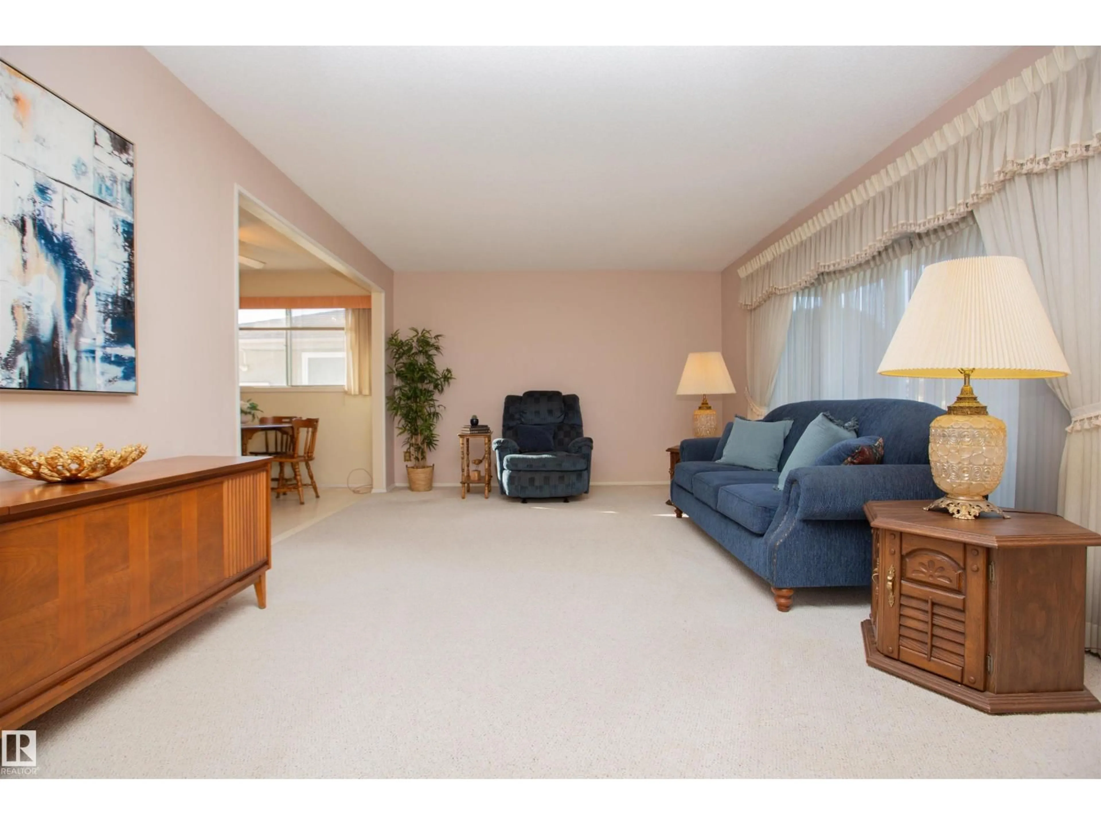 Living room with furniture, unknown for 5603 92 AV, Edmonton Alberta T6B0S2