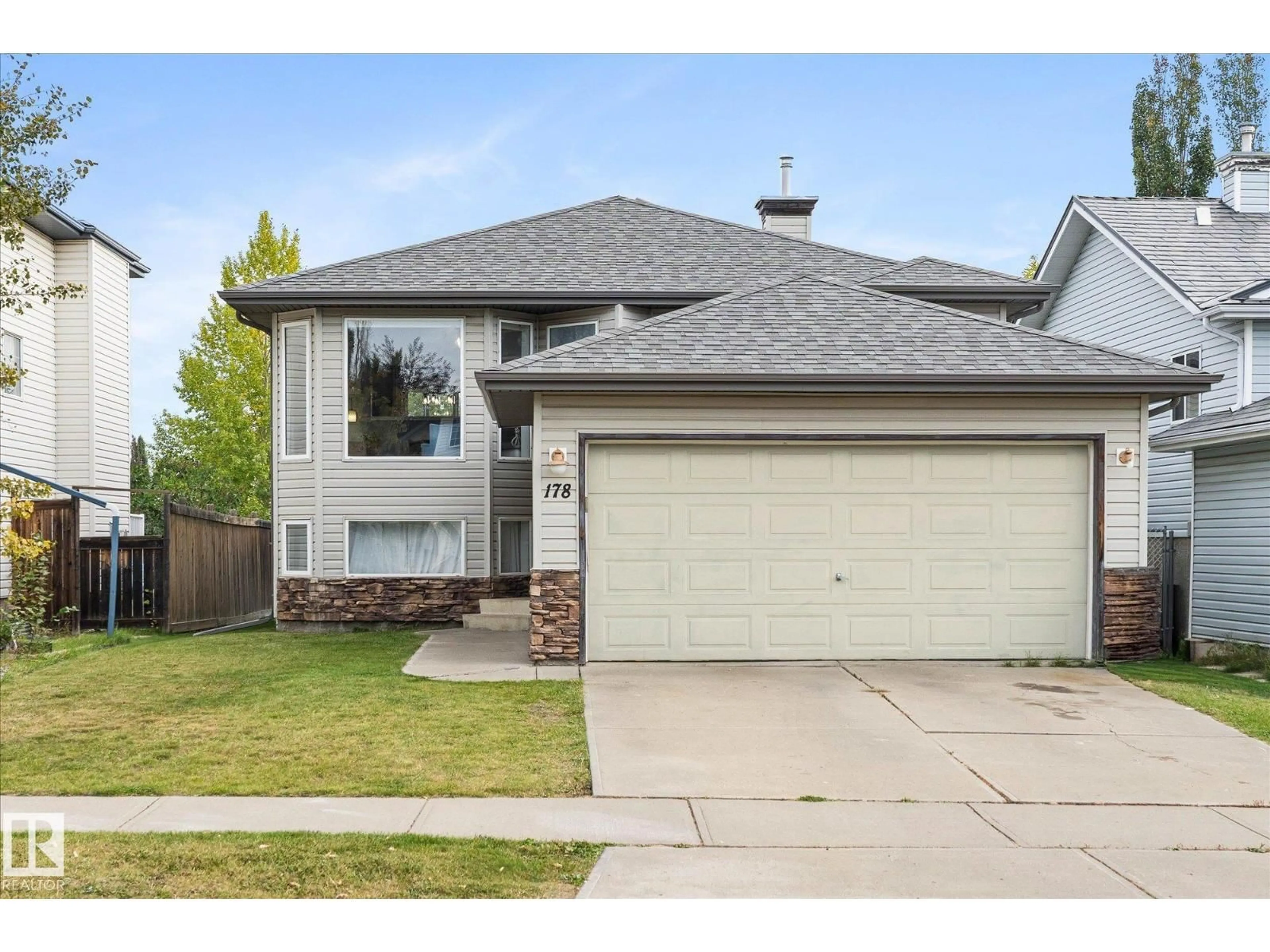Home with vinyl exterior material, street for 178 LAKELAND DR, Spruce Grove Alberta T7X4B5