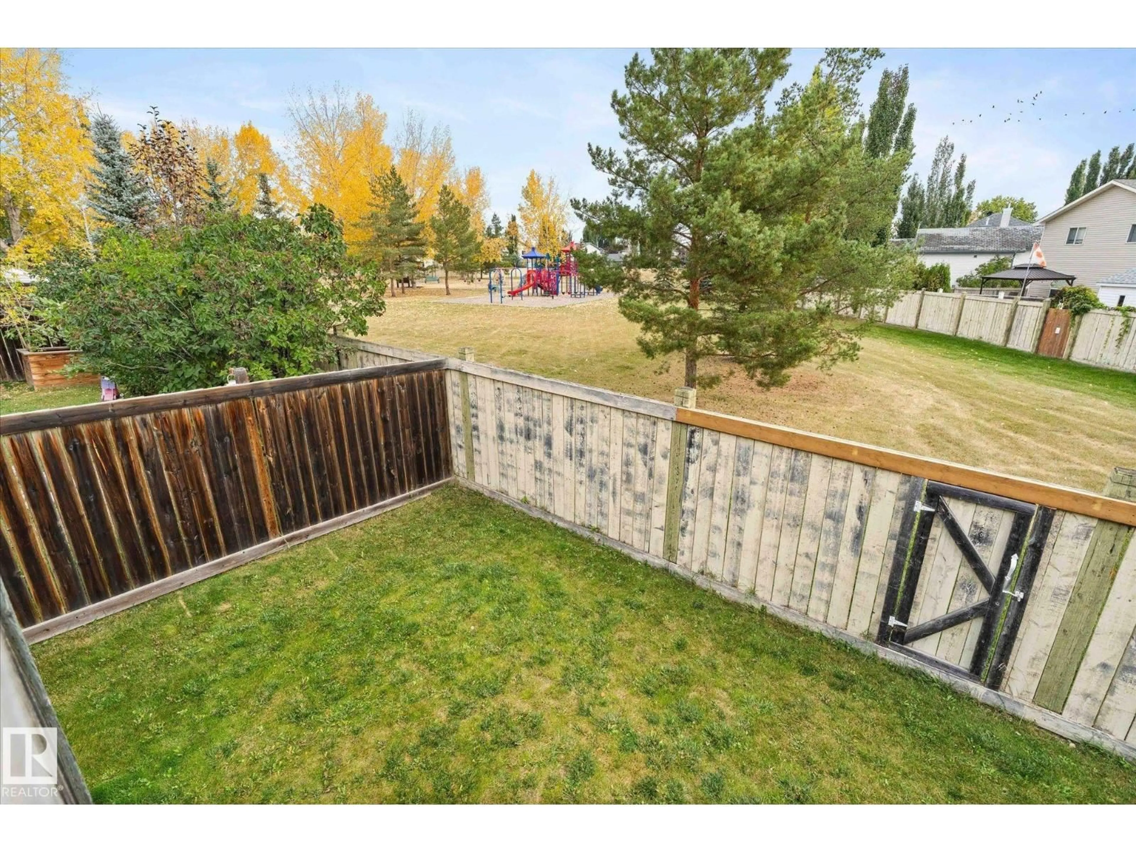 A pic from outside/outdoor area/front of a property/back of a property/a pic from drone, forest/trees view for 178 LAKELAND DR, Spruce Grove Alberta T7X4B5